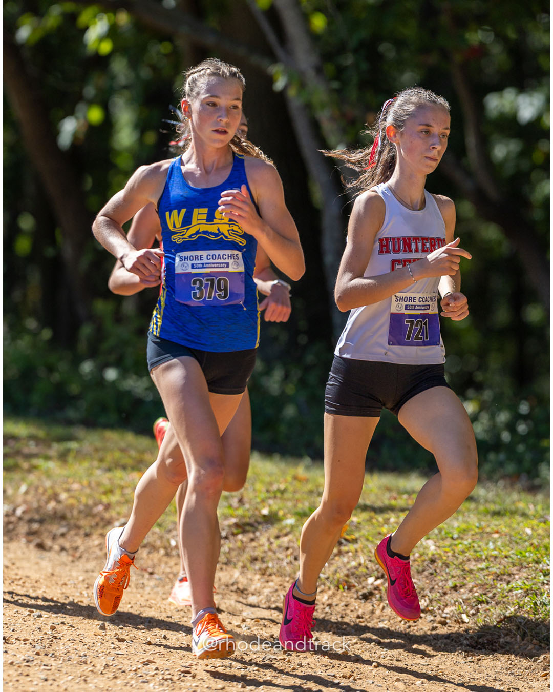 379 Julia Kelly - Downingtown West - 18:22 - 721 Molly Domurat - Hunterdon - 18:38 - Girls Varsity A - Shore Coach’s Invitational - Varsity A race - Holmdel Park - Holmdel, NJ - October 4, 2025 File: ./dir-Girls-Varsity-A/251004-shore-invitational-holmdel-nj-october-4-2025-223-062A5368.jpg 379 Julia Kelly - Downingtown West - 18:22 - 721 Molly Domurat - Hunterdon - 18:38 - Girls Varsity A - Shore Coach’s Invitational - Varsity…