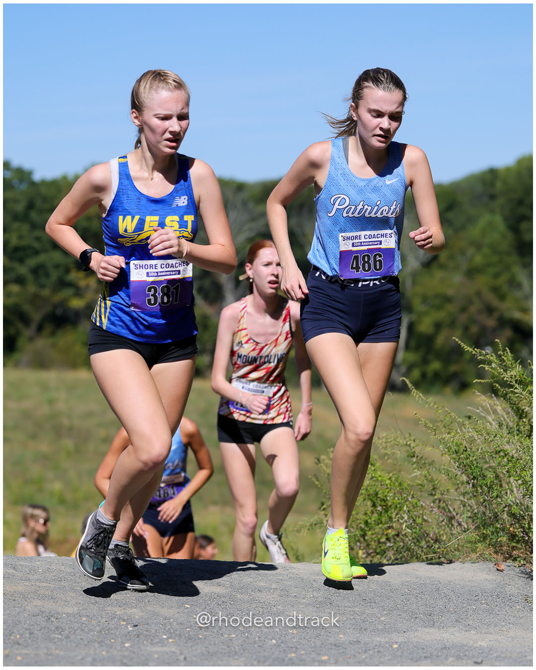 Neve Lambert - Downingtown West 01 - 22:17 - June Sprunger - Freehold Tow - 21:32 - Girls Varsity A - Shore Coach’s Invitational - Varsity A race - Holmdel Park - Holmdel, NJ - October 4, 2025 File: ./dir-Girls-Varsity-A/251004-shore-invitational-holmdel-nj-october-4-2025-272-296A3542.jpg Neve Lambert - Downingtown West 01 - 22:17 - June Sprunger - Freehold Tow - 21:32 - Girls Varsity A - Shore Coach’s Invitational - Varsity…