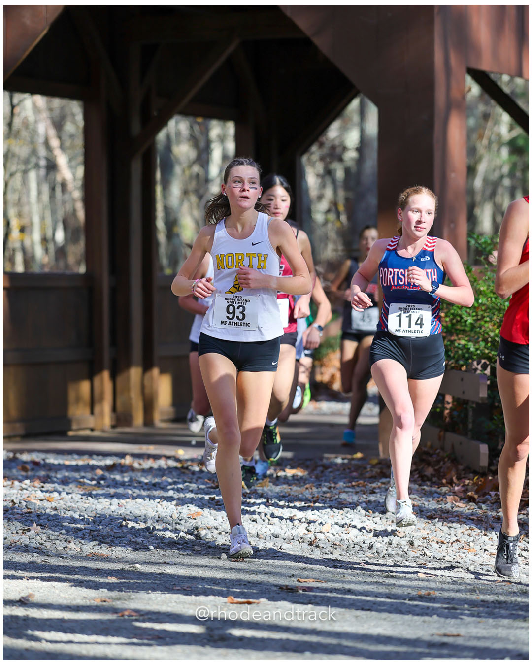 Hannah Duva, North Kingstown High School, 21:19.74, 52 - Eleni Drosinos, Portsmouth High School, 21:13.80, 46 - RI Cross Country State Championship - Ponaganset High School - North Scituate, RI - November 1, 2025 File: ./dir-1-Girls-Championship/251101-2025-RI-Cross-Country-State-Championships-Ponaganset-107-296A9344.jpg Hannah Duva, North Kingstown High School, 21:19.74, 52 - Eleni Drosinos, Portsmouth High School, 21:13.80, 46 - RI Cross Country State Cham…