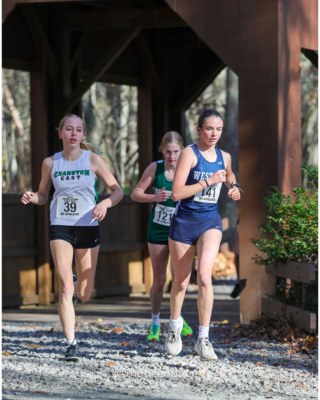 Winnie White, Cranston East High School, 21:14.51, 47 - Dacia Gingerella, Westerly High School, 21:42.05, 60 - RI Cross Country State Championship - Ponaganset High School - North Scituate, RI - November 1, 2025 File: ./dir-1-Girls-Championship/251101-2025-RI-Cross-Country-State-Championships-Ponaganset-110-296A9387.jpg Winnie White, Cranston East High School, 21:14.51, 47 - Dacia Gingerella, Westerly High School, 21:42.05, 60 - RI Cross Country State Champ…