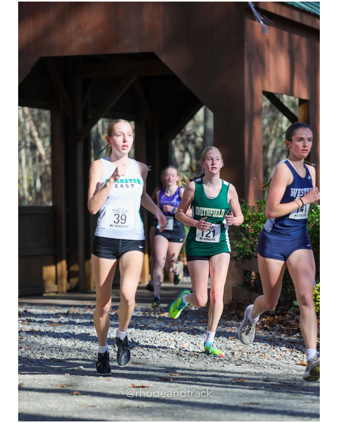 Winnie White, Cranston East High School, 21:14.51, 47 - MacKenzie Ahern, Smithfield High School, 21:46.97, 61 - RI Cross Country State Championship - Ponaganset High School - North Scituate, RI - November 1, 2025 File: ./dir-1-Girls-Championship/251101-2025-RI-Cross-Country-State-Championships-Ponaganset-111-296A9398.jpg Winnie White, Cranston East High School, 21:14.51, 47 - MacKenzie Ahern, Smithfield High School, 21:46.97, 61 - RI Cross Country State Cham…