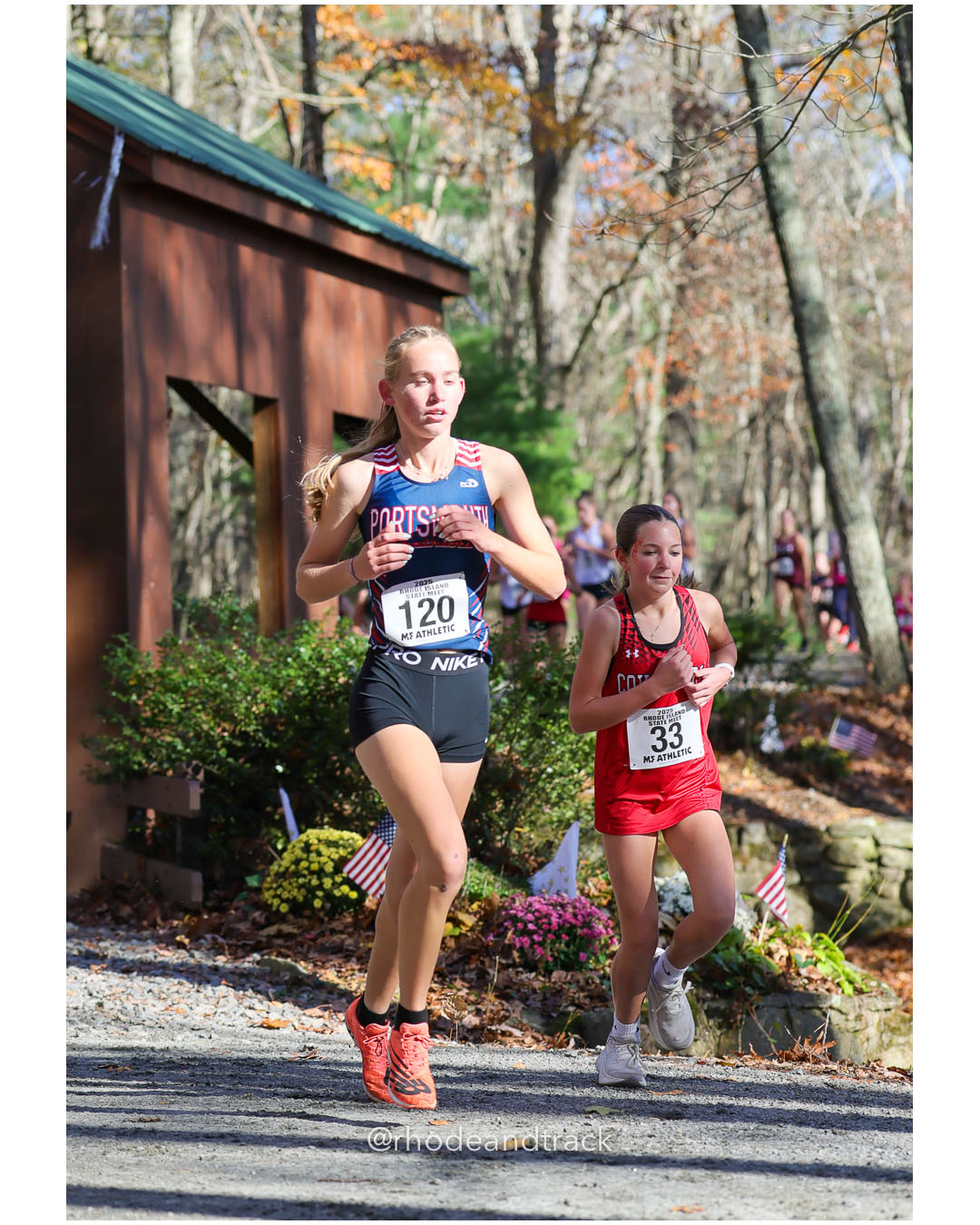Hanalei Streuli, Portsmouth High School, 23:55.37, 109 - Ava O'Connell, Coventry High School, 22:34.81, 81 - RI Cross Country State Championship - Ponaganset High School - North Scituate, RI - November 1, 2025 File: ./dir-1-Girls-Championship/251101-2025-RI-Cross-Country-State-Championships-Ponaganset-135-296A9645.jpg Hanalei Streuli, Portsmouth High School, 23:55.37, 109 - Ava O'Connell, Coventry High School, 22:34.81, 81 - RI Cross Country State Champio…