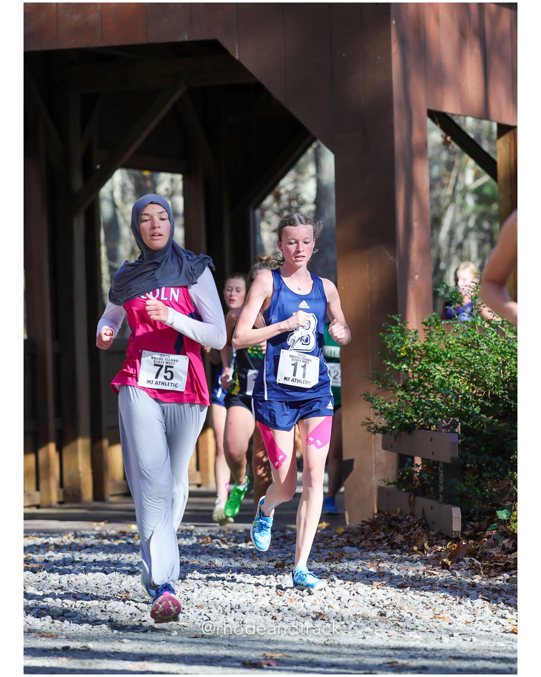 Khadija Kouraj, Lincoln High School, 23:36.52, 104 - Chelsea Demers, Burrillville High School, 23:49.24, 106 - RI Cross Country State Championship - Ponaganset High School - North Scituate, RI - November 1, 2025 File: ./dir-1-Girls-Championship/251101-2025-RI-Cross-Country-State-Championships-Ponaganset-153-296A9830.jpg Khadija Kouraj, Lincoln High School, 23:36.52, 104 - Chelsea Demers, Burrillville High School, 23:49.24, 106 - RI Cross Country State Champ…