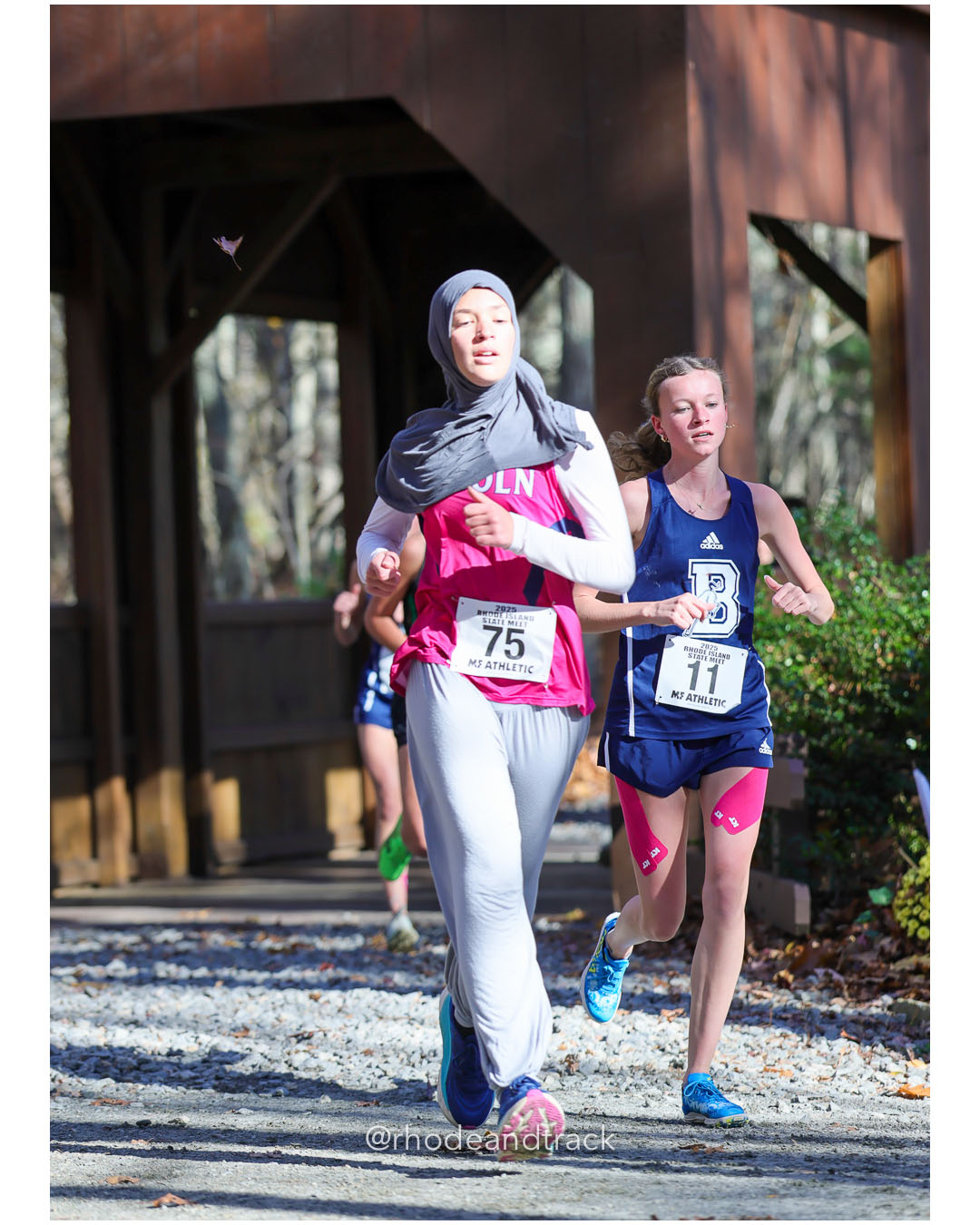 Khadija Kouraj, Lincoln High School, 23:36.52, 104 - Chelsea Demers, Burrillville High School, 23:49.24, 106 - RI Cross Country State Championship - Ponaganset High School - North Scituate, RI - November 1, 2025 File: ./dir-1-Girls-Championship/251101-2025-RI-Cross-Country-State-Championships-Ponaganset-154-296A9841.jpg Khadija Kouraj, Lincoln High School, 23:36.52, 104 - Chelsea Demers, Burrillville High School, 23:49.24, 106 - RI Cross Country State Champ…