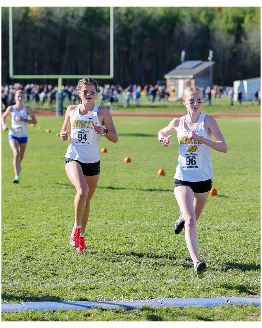 Abby O'Neil, North Kingstown High School 18:55.25, 5 - Abbie Tighe, North Kingstown High School, 18:54.91, 4 - RI Cross Country State Championship - Ponaganset High School - North Scituate, RI - November 1, 2025 File: ./dir-1-Girls-Championship/251101-2025-RI-Cross-Country-State-Championships-Ponaganset-200-296A1226.jpg Abby O'Neil, North Kingstown High School 18:55.25, 5 - Abbie Tighe, North Kingstown High School, 18:54.91, 4 - RI Cross Country State Champ…
