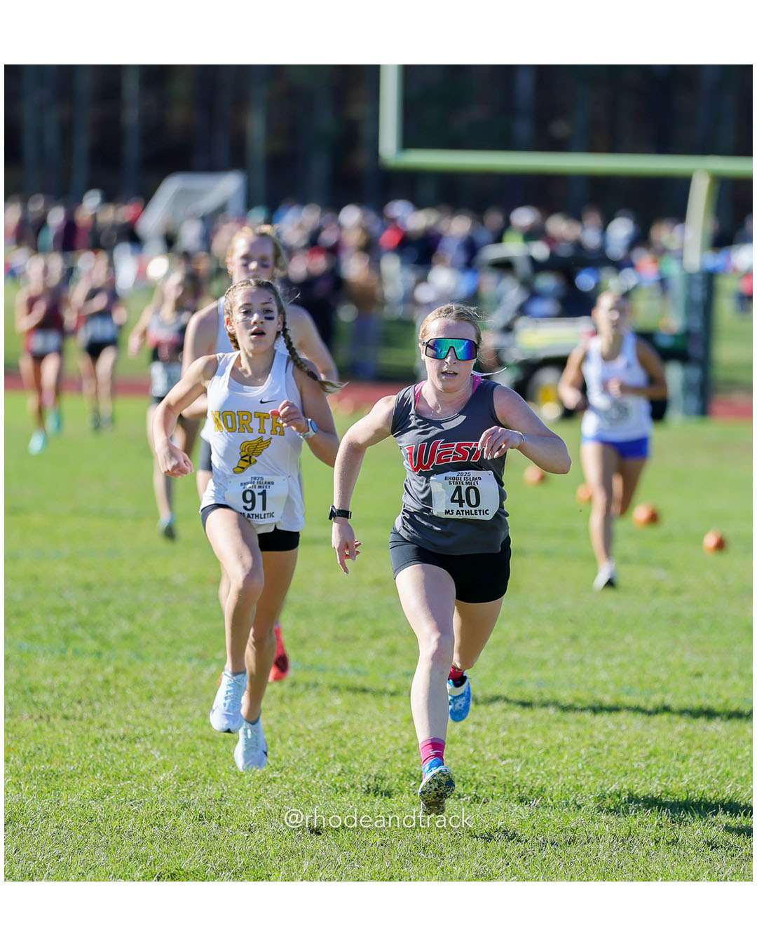 Mackenzie Baker, North Kingstown High School, 20:34.70, 33 - Kristen Fountaine, Cranston West HS, 20:34.19, 32 - RI Cross Country State Championship - Ponaganset High School - North Scituate, RI - November 1, 2025 File: ./dir-1-Girls-Championship/251101-2025-RI-Cross-Country-State-Championships-Ponaganset-254-296A2765.jpg Mackenzie Baker, North Kingstown High School, 20:34.70, 33 - Kristen Fountaine, Cranston West HS, 20:34.19, 32 - RI Cross Country State Cha…