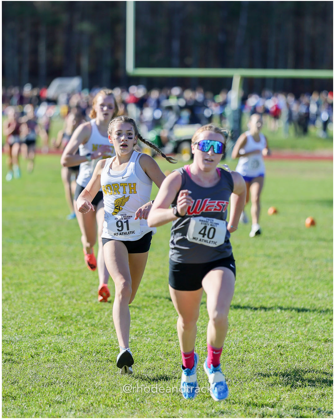 Mackenzie Baker, North Kingstown High School, 20:34.70, 33 - Kristen Fountaine, Cranston West HS, 20:34.19, 32 - RI Cross Country State Championship - Ponaganset High School - North Scituate, RI - November 1, 2025 File: ./dir-1-Girls-Championship/251101-2025-RI-Cross-Country-State-Championships-Ponaganset-255-296A2799.jpg Mackenzie Baker, North Kingstown High School, 20:34.70, 33 - Kristen Fountaine, Cranston West HS, 20:34.19, 32 - RI Cross Country State Cha…