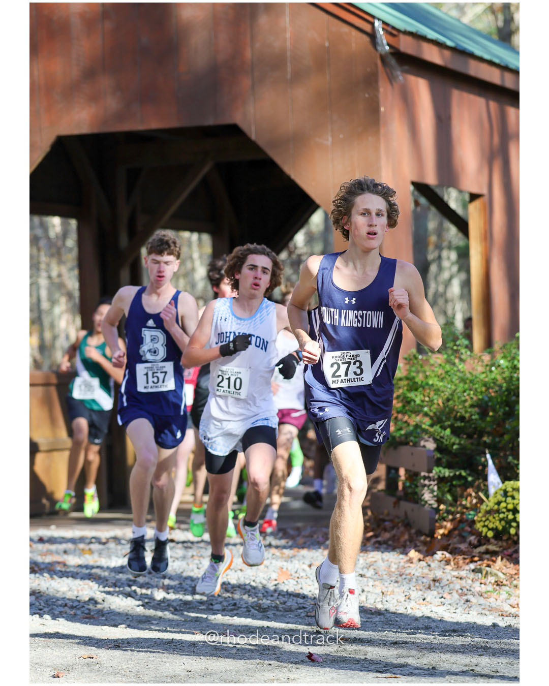Drew Gaulin, Burrillville High School, 17:12.37, 33 - Logan Finelli, Johnston High School, 18:05.14, 61 - Erik Dahl, South Kingstown High School, 18:26.57, 74 - RI Cross Country State Championship - Ponaganset High School - North Scituate, RI - November 1, 2025 File: ./dir-2-Boys-Championship/251101-2025-RI-Cross-Country-State-Championships-Ponaganset-510-296A6444.jpg Drew Gaulin, Burrillville High School, 17:12.37, 33 - Logan Finelli, Johnston High School, 18:05.14, 61 - Erik Dahl, South Kingstown High S…