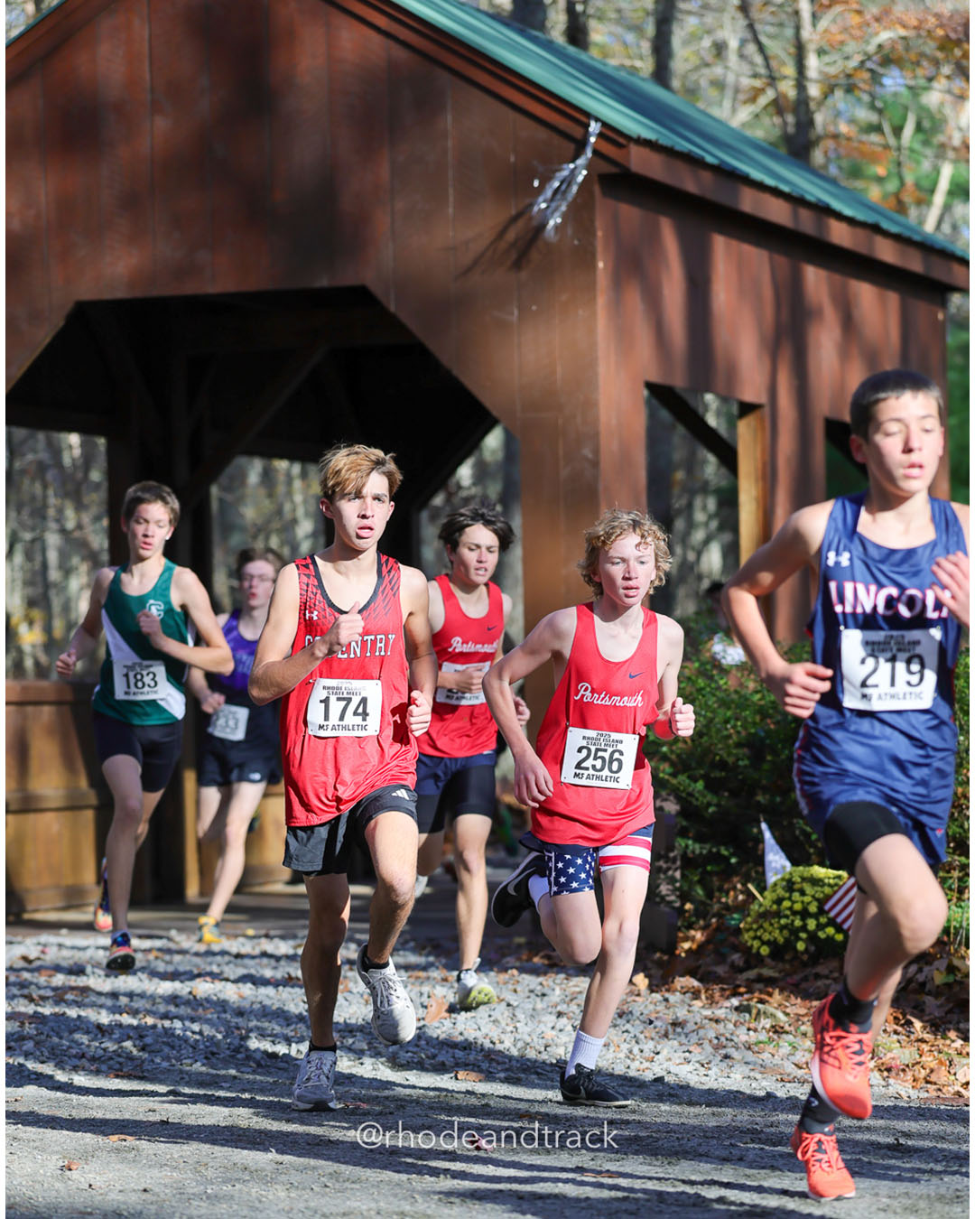 Jack Bucacci, Coventry High School, 19:04.16, 107 - Greyson Barth, Portsmouth High School, 19:05.89, 108 - RI Cross Country State Championship - Ponaganset High School - North Scituate, RI - November 1, 2025 File: ./dir-2-Boys-Championship/251101-2025-RI-Cross-Country-State-Championships-Ponaganset-530-296A6758.jpg Jack Bucacci, Coventry High School, 19:04.16, 107 - Greyson Barth, Portsmouth High School, 19:05.89, 108 - RI Cross Country State Champions…