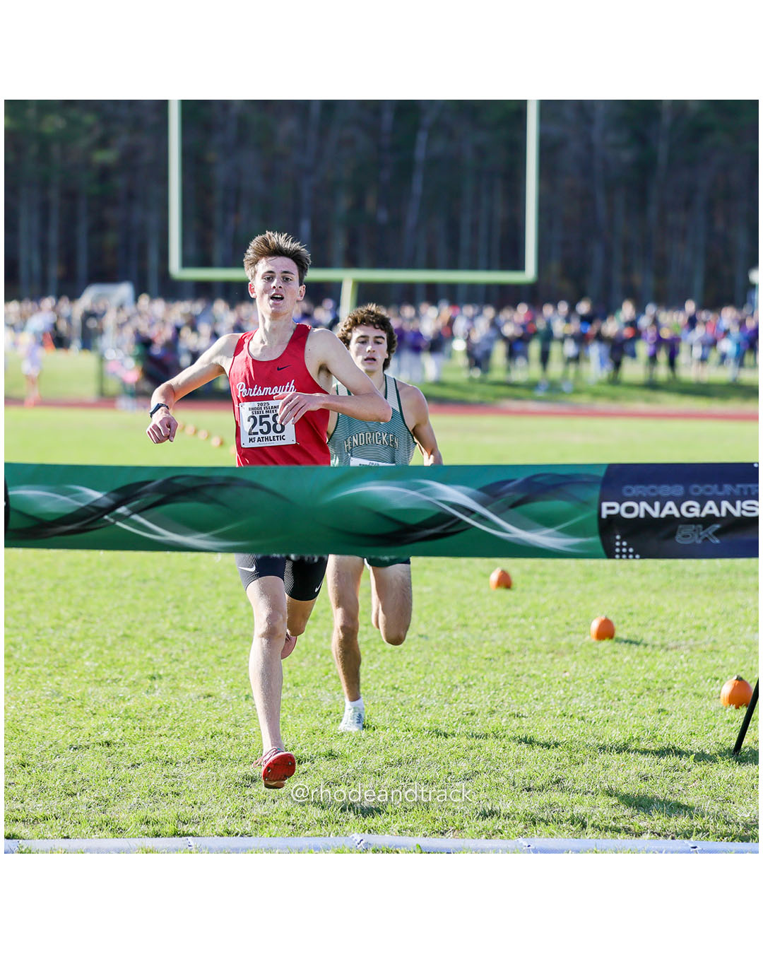 Sean Gray, Portsmouth High School, 15:16.10, 1 - Colby Flynn, Bishop Hendricken High School, 15:16.51, 2 - RI Cross Country State Championship - Ponaganset High School - North Scituate, RI - November 1, 2025 File: ./dir-2-Boys-Championship/251101-2025-RI-Cross-Country-State-Championships-Ponaganset-558-296A7137.jpg Sean Gray, Portsmouth High School, 15:16.10, 1 - Colby Flynn, Bishop Hendricken High School, 15:16.51, 2 - RI Cross Country State Champions…
