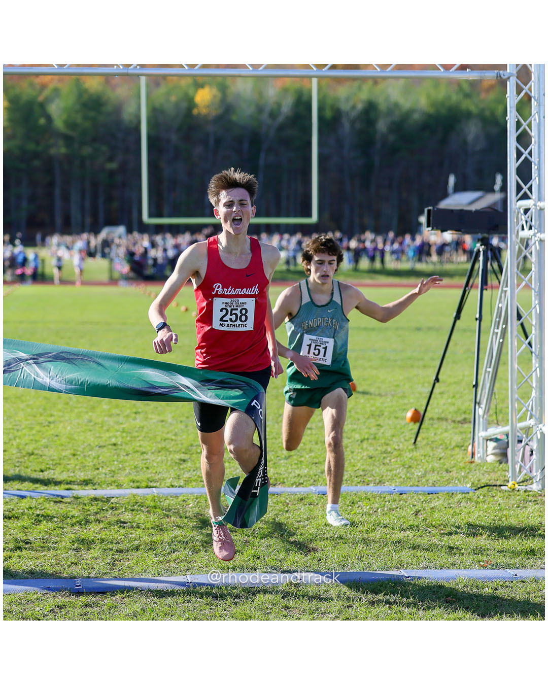 Sean Gray, Portsmouth High School, 15:16.10, 1 - Colby Flynn, Bishop Hendricken High School, 15:16.51, 2 - RI Cross Country State Championship - Ponaganset High School - North Scituate, RI - November 1, 2025 File: ./dir-2-Boys-Championship/251101-2025-RI-Cross-Country-State-Championships-Ponaganset-561-296A7176.jpg Sean Gray, Portsmouth High School, 15:16.10, 1 - Colby Flynn, Bishop Hendricken High School, 15:16.51, 2 - RI Cross Country State Champions…