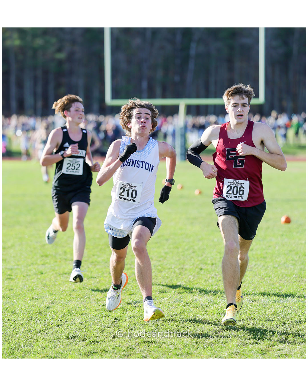 Logan Finelli, Johnston High School, 18:05.14, 61 - William Norris, East Greenwich High School, 18:05.22, 62 - RI Cross Country State Championship - Ponaganset High School - North Scituate, RI - November 1, 2025 File: ./dir-2-Boys-Championship/251101-2025-RI-Cross-Country-State-Championships-Ponaganset-632-296A8874.jpg Logan Finelli, Johnston High School, 18:05.14, 61 - William Norris, East Greenwich High School, 18:05.22, 62 - RI Cross Country State Champ…