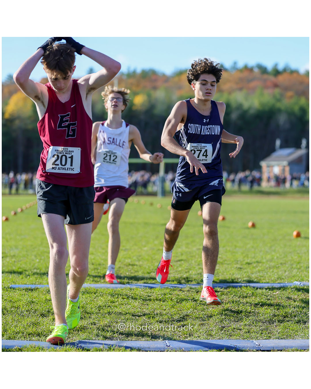 Quinn Connolly, East Greenwich High School, 18:30.86, 77 - Jackson Lewis, La Salle Academy, 18:32.44, 79 - Lucas DeSimone, South Kingstown High School, 18:31.87, 78 - RI Cross Country State Championship - Ponaganset High School - North Scituate, RI - November 1, 2025 File: ./dir-2-Boys-Championship/251101-2025-RI-Cross-Country-State-Championships-Ponaganset-651-296A9181.jpg Quinn Connolly, East Greenwich High School, 18:30.86, 77 - Jackson Lewis, La Salle Academy, 18:32.44, 79 - Lucas DeSimone, South Kingstown…