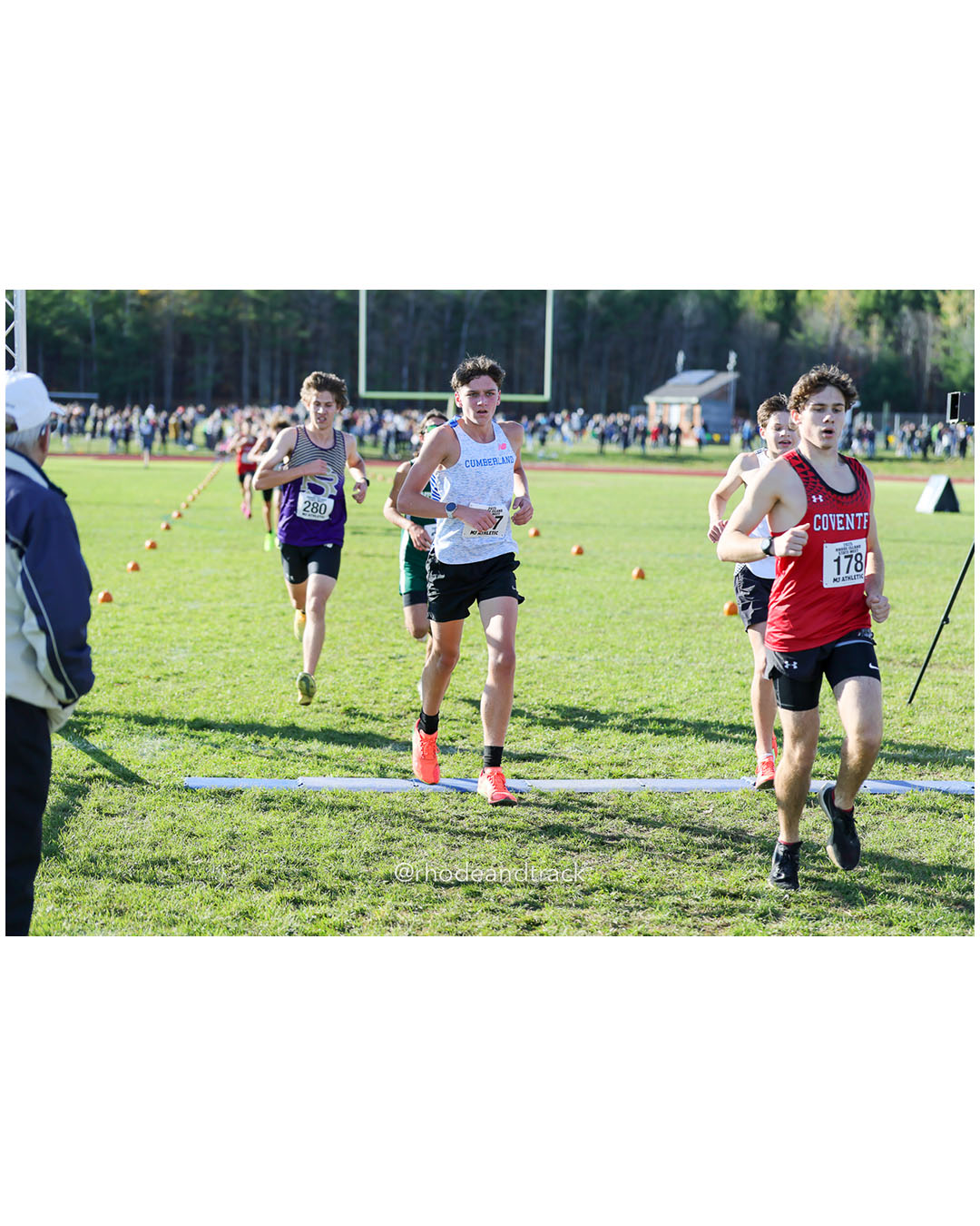Tyler Pinch, Cumberland, 18:55.18, 98 - Declan McConkey, Coventry High School, 18:54.79, 97 - RI Cross Country State Championship - Ponaganset High School - North Scituate, RI - November 1, 2025 File: ./dir-2-Boys-Championship/251101-2025-RI-Cross-Country-State-Championships-Ponaganset-661-296A9421.jpg Tyler Pinch, Cumberland, 18:55.18, 98 - Declan McConkey, Coventry High School, 18:54.79, 97 - RI Cross Country State Championship - Ponagan…
