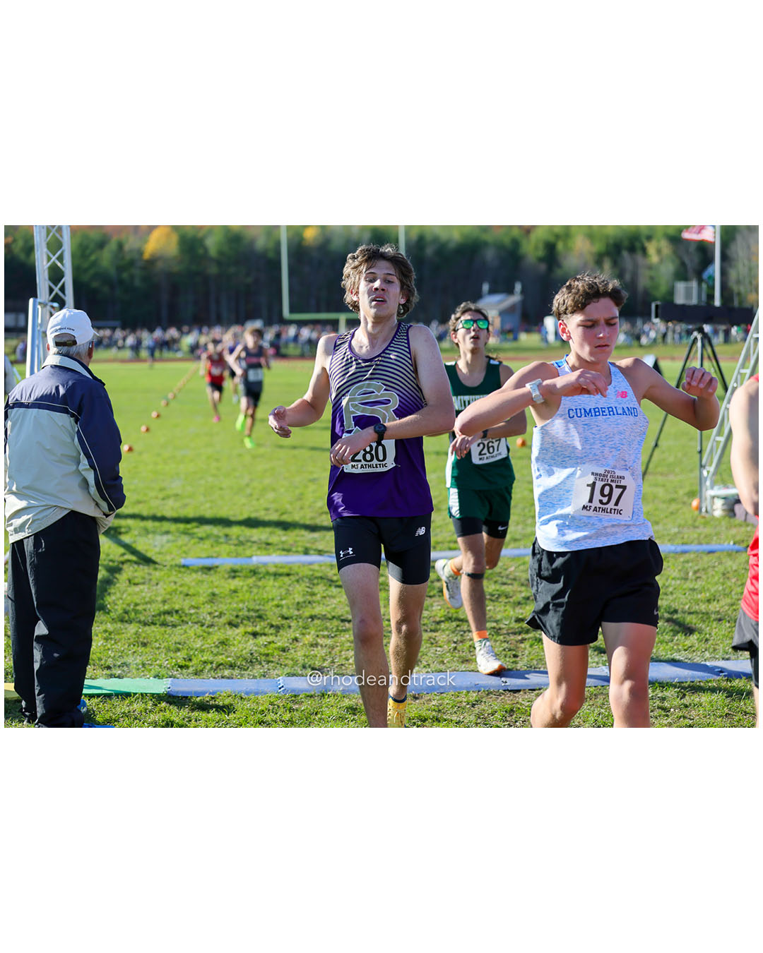 Michael Duschang, St. Raphael Academy, 18:55.99, 100 - Avery Ferreira, Smithfield High School, 18:56.13, 101 - Tyler Pinch, Cumberland, 18:55.18, 98 - RI Cross Country State Championship - Ponaganset High School - North Scituate, RI - November 1, 2025 File: ./dir-2-Boys-Championship/251101-2025-RI-Cross-Country-State-Championships-Ponaganset-662-296A9440.jpg Michael Duschang, St. Raphael Academy, 18:55.99, 100 - Avery Ferreira, Smithfield High School, 18:56.13, 101 - Tyler Pinch, Cumberland, 18:…
