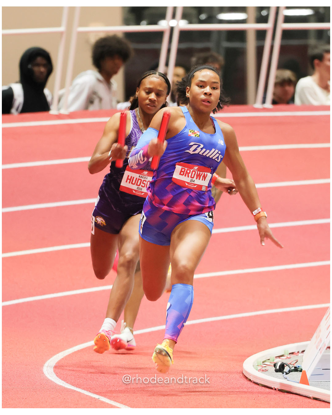 Brown, Bullis - Girls 4x200m Relay - New Balance Indoor Nationals 2026 - the TRACK at New Balance - Boston, Massachusetts - March 14, 2026 File: ./dir-Girls-4x200m-Relay/260314-2026-New-Balance-Indoor-Nationals-Boston-MA-Saturday-696-296A8051.jpg Brown, Bullis - Girls 4x200m Relay - New Balance Indoor Nationals 2026 - the TRACK at New Balance - Boston, Massachusetts - March 14, 2026…