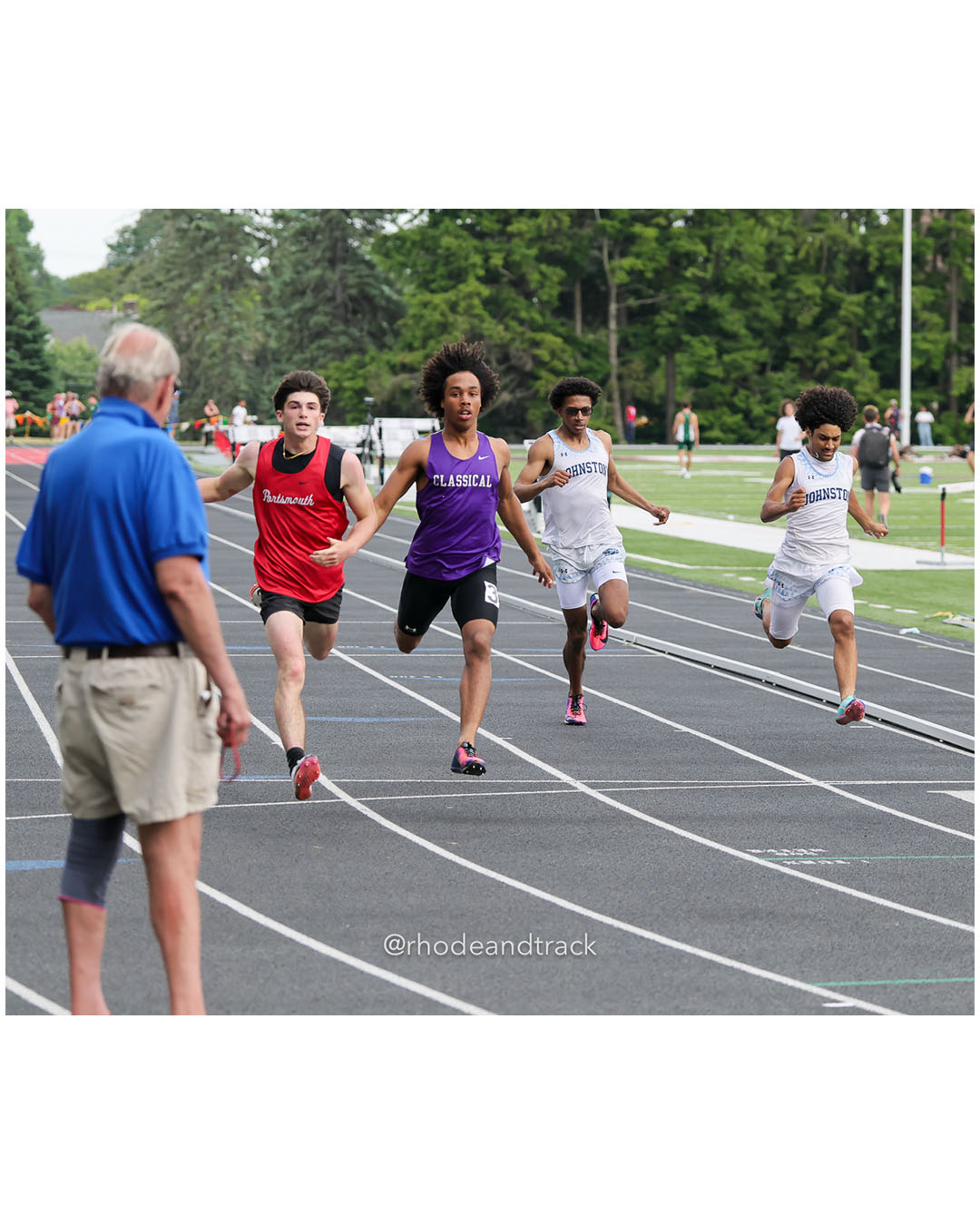 Shane Rogers, Portsmouth High School, 10 - Diego Benjamin, Classical High School, 9 - Albert Nunez, Johnston High School, 11 - Elias Milhouse, Johnston High School, 12 - 2026 RI Outdoor Track and Field State Championships - Brown Stadium - Providence, Rhode Island - June 06, 2026 File: ./dir-200m/260606-2026-RI-Outdoor-Track-And-Field-State-Championships-Brown-794-296A3915.jpg Shane Rogers, Portsmouth High School, 10 - Diego Benjamin, Classical High School, 9 - Albert Nunez, Johnston High School, 11 - Elias Milhou…