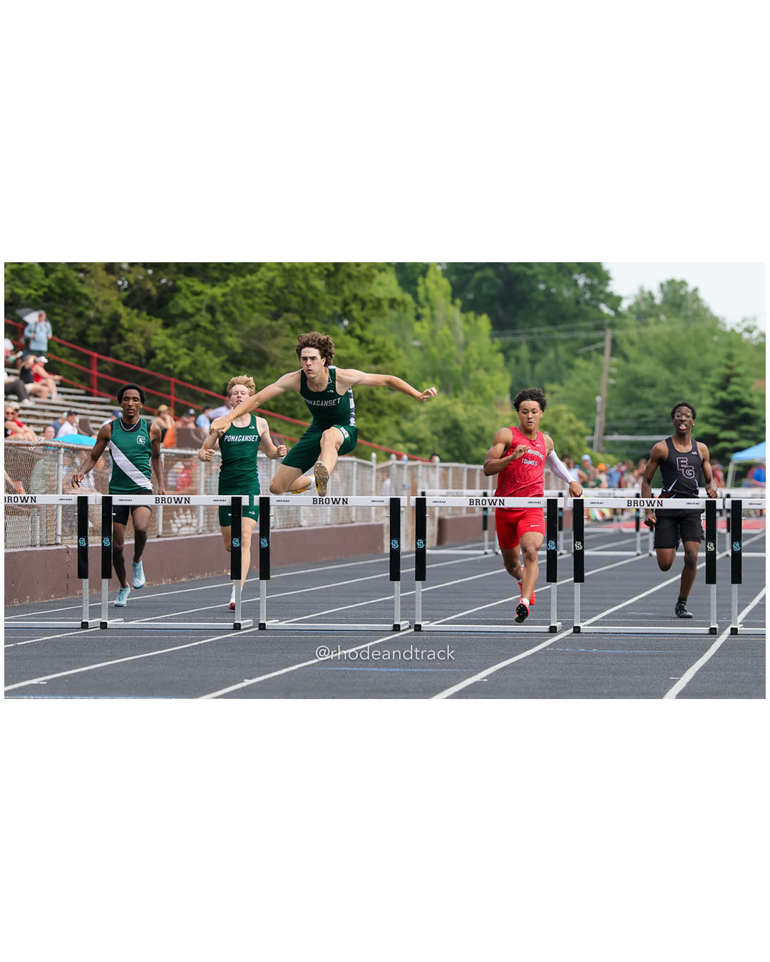 Paxton Allen, Ponaganset High School, 12 - Araoluwa Adetunji, East Greenwich High School, 11 - Daniel Perez, Cranston East High School, 12 - Ryan McEntee, Ponaganset High School, 12 - Isaac Rodriguez, East Providence High School, 11 - 2026 RI Outdoor Track and Field State Championships - Brown Stadium - Providence, Rhode Island - June 06, 2026 File: ./dir-300-Hurdles/260606-2026-RI-Outdoor-Track-And-Field-State-Championships-Brown-632-296A7083.jpg Paxton Allen, Ponaganset High School, 12 - Araoluwa Adetunji, East Greenwich High School, 11 - Daniel Perez, Cranston East High School, 12…