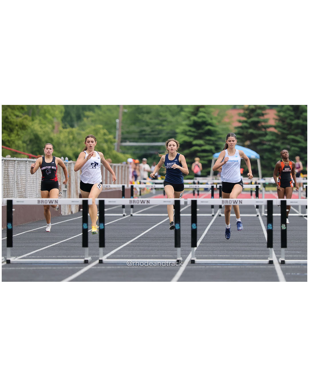 Maya Cicchitelli, Cranston West HS, 11 - Sybil Lorincz, Moses Brown School, 9 - Luciana Starkey, South Kingstown High School, 9 - Madeline Coyne, Cumberland, 11 - Ivory Black, West Warwick High School, 9 - Soo Yeon Park, Barrington High School, 10 - 2026 RI Outdoor Track and Field State Championships - Brown Stadium - Providence, Rhode Island - June 06, 2026 File: ./dir-300-Hurdles/260606-2026-RI-Outdoor-Track-And-Field-State-Championships-Brown-647-296A7910.jpg Maya Cicchitelli, Cranston West HS, 11 - Sybil Lorincz, Moses Brown School, 9 - Luciana Starkey, South Kingstown High School, 9 - Madeline…