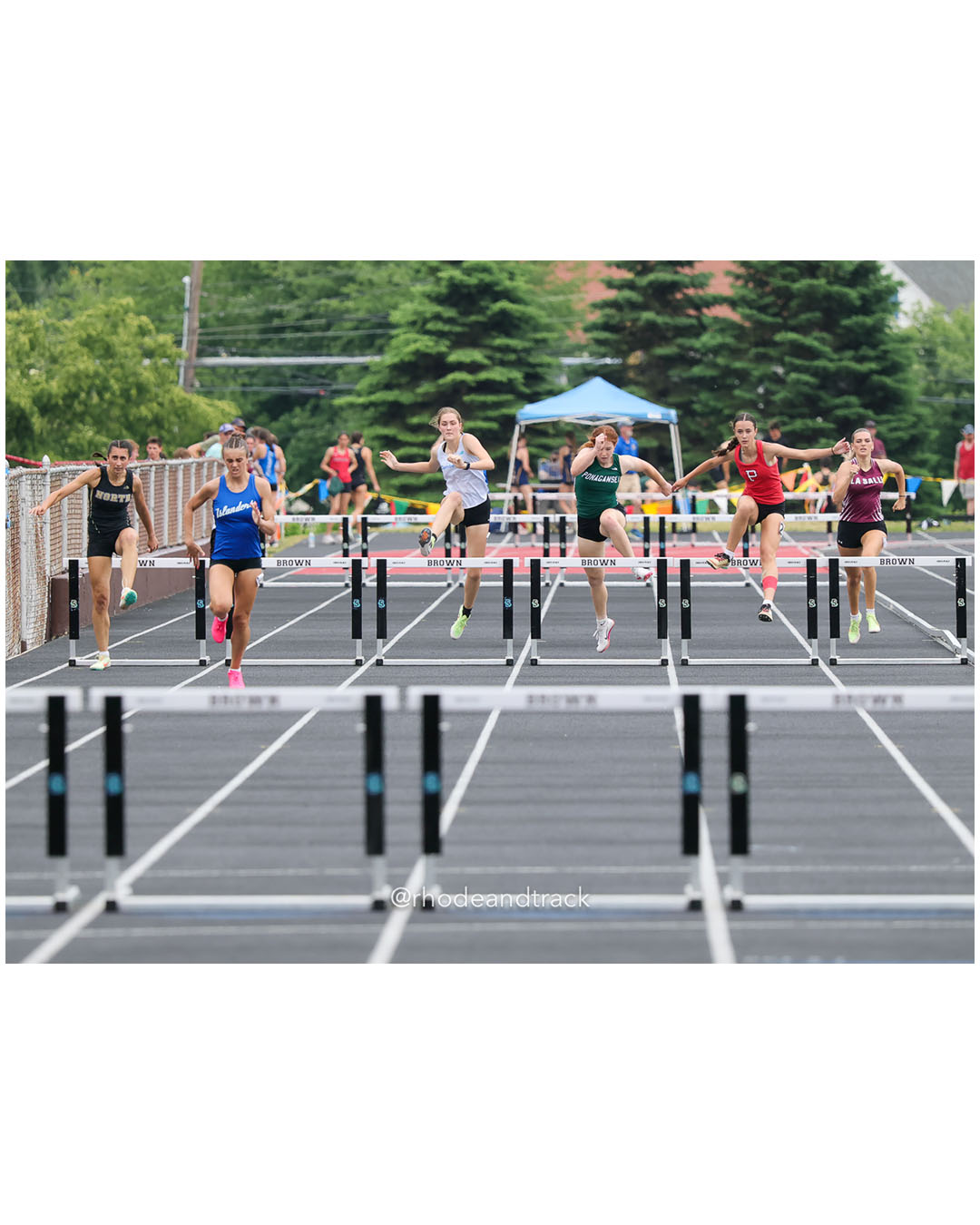 Maya Ferris, Middletown High School, 10 - Loosaper Tate, Portsmouth High School, 10 - Anna Lafontaine, Ponaganset High School, 11 - Elena Pacheco, Cumberland, 11 - Julianna Williams, North Kingstown High School, 12 - Malia Miller, La Salle Academy, 11 - 2026 RI Outdoor Track and Field State Championships - Brown Stadium - Providence, Rhode Island - June 06, 2026 File: ./dir-300-Hurdles/260606-2026-RI-Outdoor-Track-And-Field-State-Championships-Brown-651-296A8188.jpg Maya Ferris, Middletown High School, 10 - Loosaper Tate, Portsmouth High School, 10 - Anna Lafontaine, Ponaganset High School, 11 - Elena P…