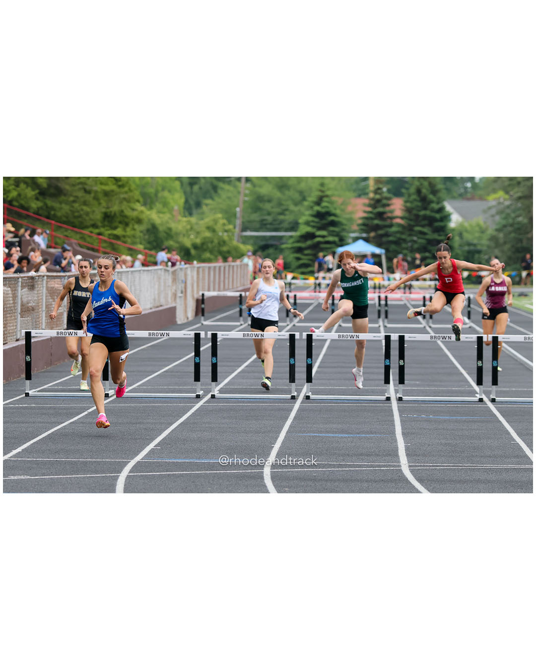 Maya Ferris, Middletown High School, 10 - Elena Pacheco, Cumberland, 11 - Anna Lafontaine, Ponaganset High School, 11 - Loosaper Tate, Portsmouth High School, 10 - Julianna Williams, North Kingstown High School, 12 - 2026 RI Outdoor Track and Field State Championships - Brown Stadium - Providence, Rhode Island - June 06, 2026 File: ./dir-300-Hurdles/260606-2026-RI-Outdoor-Track-And-Field-State-Championships-Brown-653-296A8335.jpg Maya Ferris, Middletown High School, 10 - Elena Pacheco, Cumberland, 11 - Anna Lafontaine, Ponaganset High School, 11 - Loosaper Tate, Port…