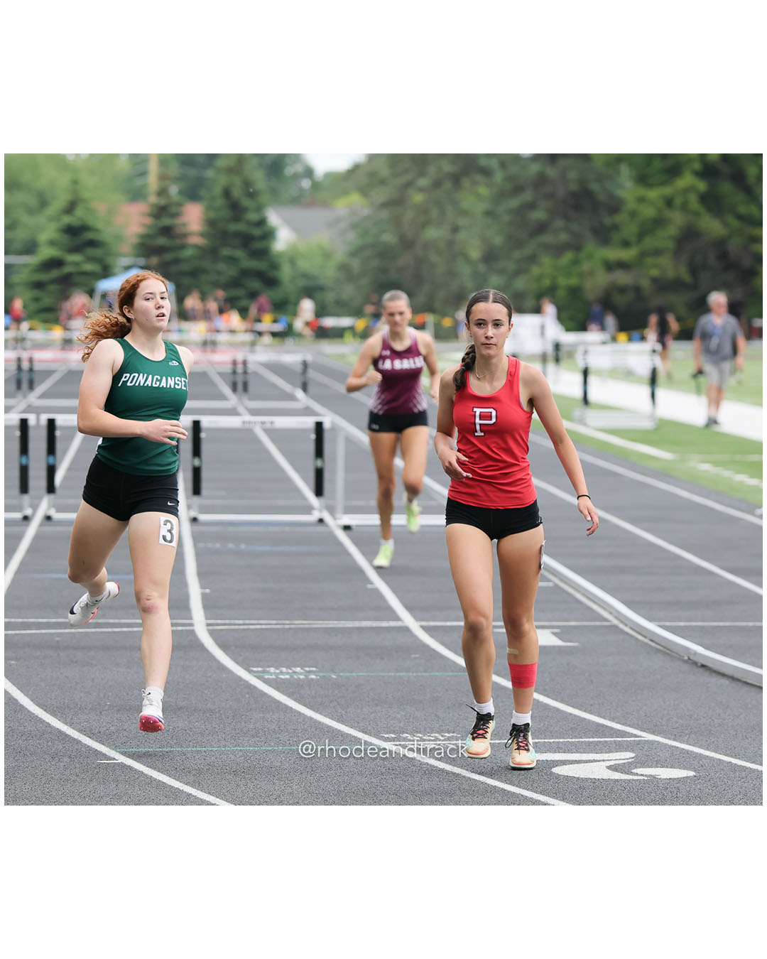 Loosaper Tate, Portsmouth High School, 10 - Anna Lafontaine, Ponaganset High School, 11 - Malia Miller, La Salle Academy, 11 - 2026 RI Outdoor Track and Field State Championships - Brown Stadium - Providence, Rhode Island - June 06, 2026 File: ./dir-300-Hurdles/260606-2026-RI-Outdoor-Track-And-Field-State-Championships-Brown-654-296A8409.jpg Loosaper Tate, Portsmouth High School, 10 - Anna Lafontaine, Ponaganset High School, 11 - Malia Miller, La Salle Academy, 11 - 2026 RI Outd…
