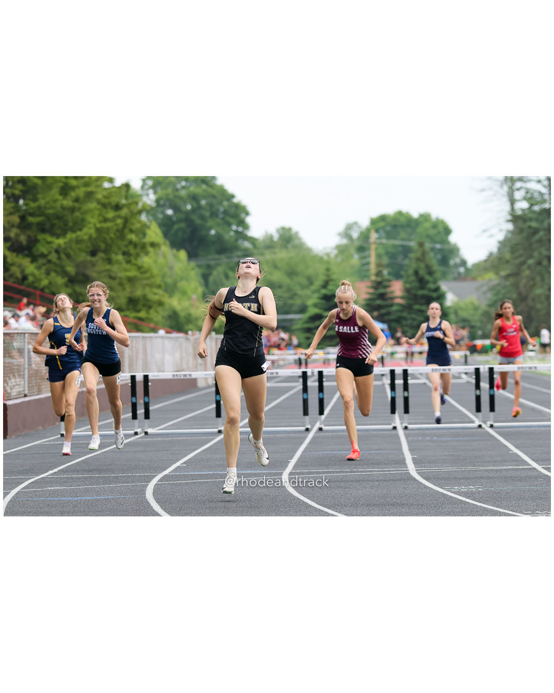Reagan Farrell, North Kingstown High School, 10 - Bria Bender, South Kingstown High School, 9 - Jillian Lewis, La Salle Academy, 11 - Charlotte Farrell, Barrington High School, 10 - Dacia Gingerella, Westerly High School, 12 - 2026 RI Outdoor Track and Field State Championships - Brown Stadium - Providence, Rhode Island - June 06, 2026 File: ./dir-300-Hurdles/260606-2026-RI-Outdoor-Track-And-Field-State-Championships-Brown-657-296A8835.jpg Reagan Farrell, North Kingstown High School, 10 - Bria Bender, South Kingstown High School, 9 - Jillian Lewis, La Salle Academy, 11 - Charl…