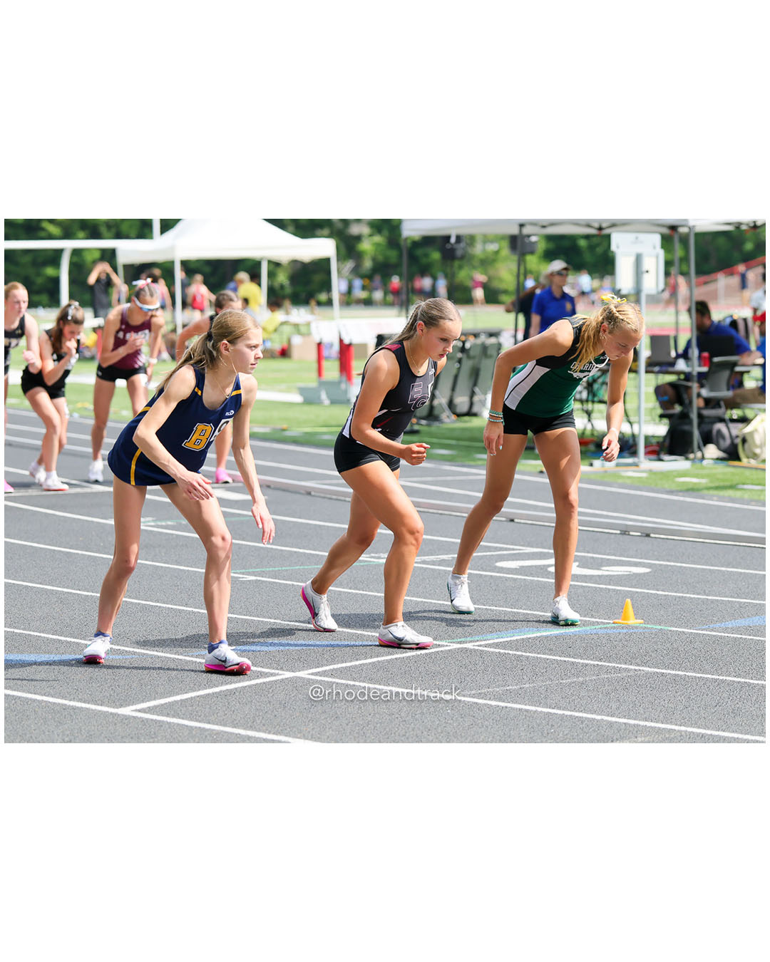 Meriden Alge, Chariho Regional High School, 9 - Kayla Siedliski, East Greenwich High School, 11 - Charlotte Ford, Barrington High School, 9 - 2026 RI Outdoor Track and Field State Championships - Brown Stadium - Providence, Rhode Island - June 06, 2026 File: ./dir-3000m/260606-2026-RI-Outdoor-Track-And-Field-State-Championships-Brown-709-296A0710.jpg Meriden Alge, Chariho Regional High School, 9 - Kayla Siedliski, East Greenwich High School, 11 - Charlotte Ford, Barrington High School, 9…