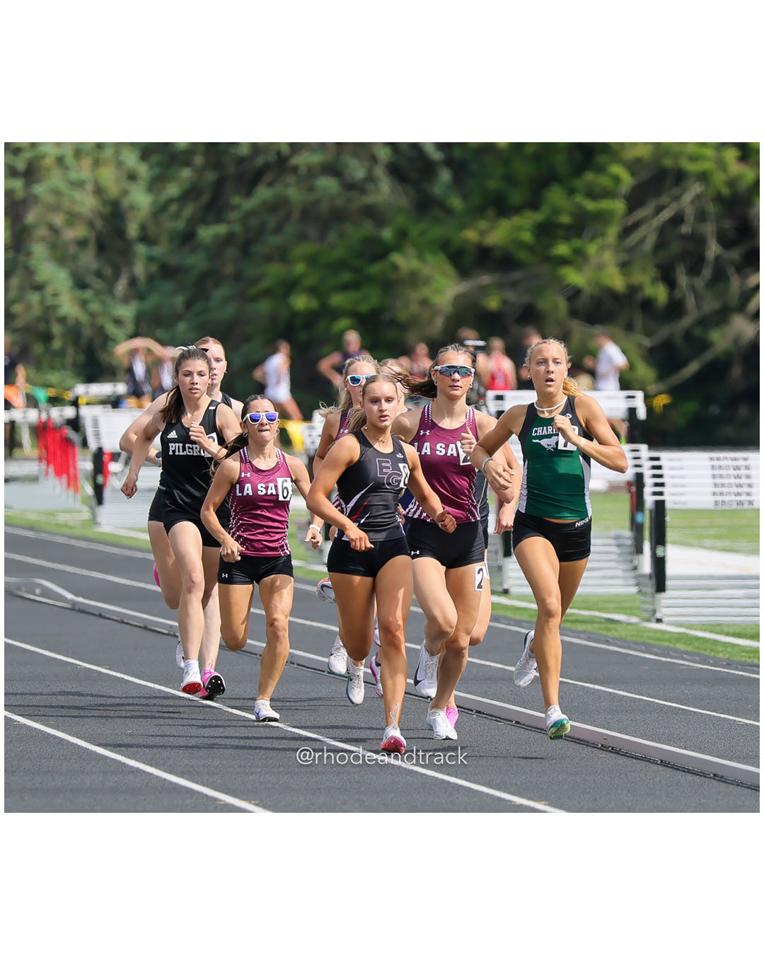 Meriden Alge, Chariho Regional High School, 9 - Alyssa Parenteau, La Salle Academy, 11 - Kayla Siedliski, East Greenwich High School, 11 - Carolina Terlato, La Salle Academy, 11 - Aubrey Jarvis, Pilgrim High School, 9 - 2026 RI Outdoor Track and Field State Championships - Brown Stadium - Providence, Rhode Island - June 06, 2026 File: ./dir-3000m/260606-2026-RI-Outdoor-Track-And-Field-State-Championships-Brown-713-296A0813.jpg Meriden Alge, Chariho Regional High School, 9 - Alyssa Parenteau, La Salle Academy, 11 - Kayla Siedliski, East Greenwich High School, 11 -…