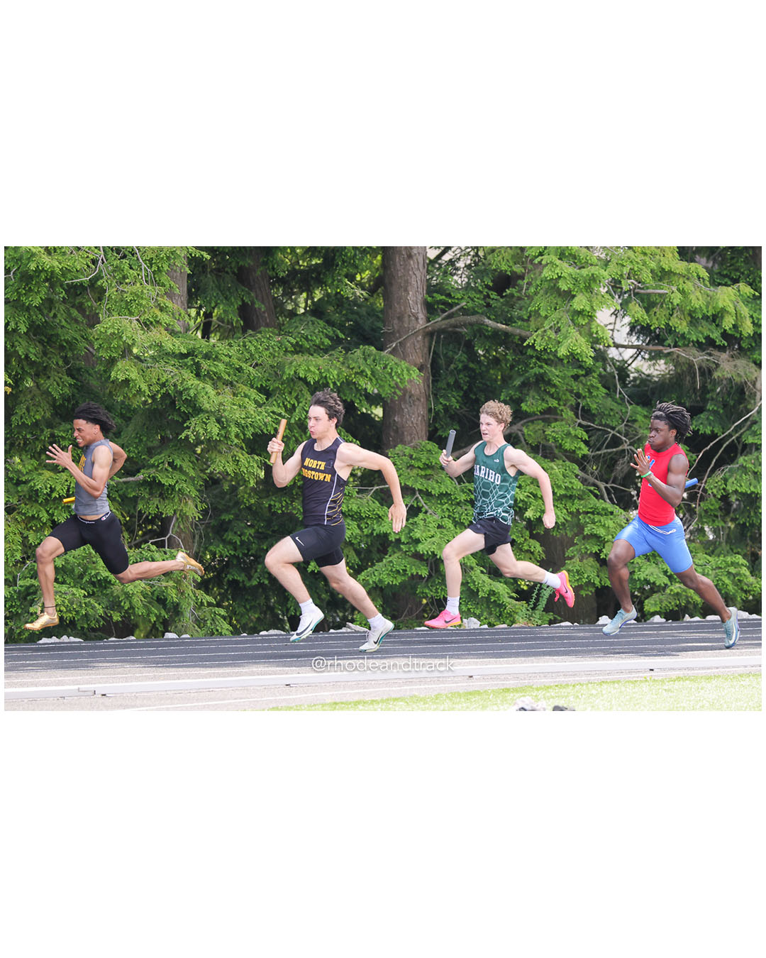 North Kingstown High School, North Kingstown High School - Chariho Regional High School, Chariho Regional High School - Mount Pleasant High School, Mount Pleasant High School - 2026 RI Outdoor Track and Field Championships - Brown Stadium - Providence, Rhode Island - June 06, 2026 File: ./dir-4x100/260606-2026-RI-Outdoor-Track-And-Field-State-Championships-Brown-359-296A6028.jpg North Kingstown High School, North Kingstown High School - Chariho Regional High School, Chariho Regional High School - Mount Pleasant High…