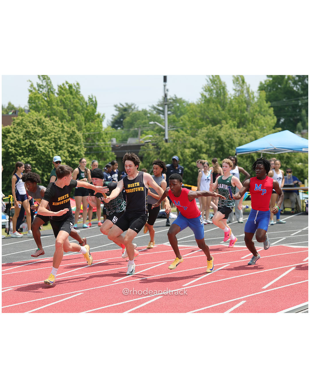 North Kingstown High School, North Kingstown High School - Mount Pleasant High School, Mount Pleasant High School - Chariho Regional High School, Chariho Regional High School - 2026 RI Outdoor Track and Field Championships - Brown Stadium - Providence, Rhode Island - June 06, 2026 File: ./dir-4x100/260606-2026-RI-Outdoor-Track-And-Field-State-Championships-Brown-363-296A6069.jpg North Kingstown High School, North Kingstown High School - Mount Pleasant High School, Mount Pleasant High School - Chariho Regional High S…