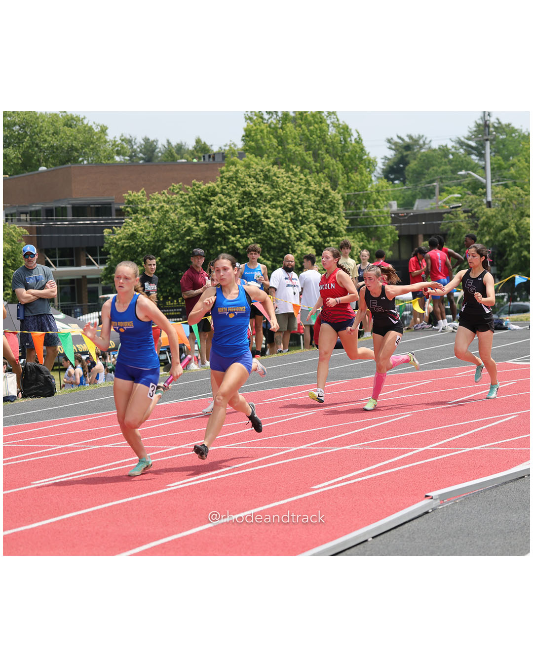 North Providence High School, North Providence High School - East Greenwich High School, East Greenwich High School - Lincoln - 2026 RI Outdoor Track and Field Championships - Brown Stadium - Providence, Rhode Island - June 06, 2026 File: ./dir-4x100/260606-2026-RI-Outdoor-Track-And-Field-State-Championships-Brown-390-296A6590.jpg North Providence High School, North Providence High School - East Greenwich High School, East Greenwich High School - Lincoln - 2026 RI Out…