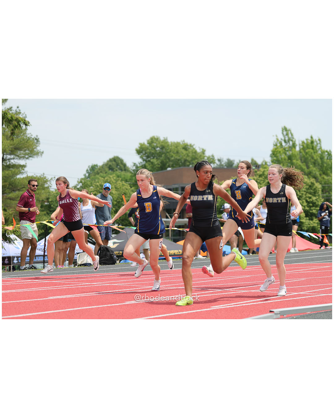 La Salle Academy, La Salle Academy - North Kingstown High School, North Kingstown High School - Barrington High School, Barrington High School - 2026 RI Outdoor Track and Field Championships - Brown Stadium - Providence, Rhode Island - June 06, 2026 File: ./dir-4x100/260606-2026-RI-Outdoor-Track-And-Field-State-Championships-Brown-407-296A6825.jpg La Salle Academy, La Salle Academy - North Kingstown High School, North Kingstown High School - Barrington High School, Barrington High Sch…