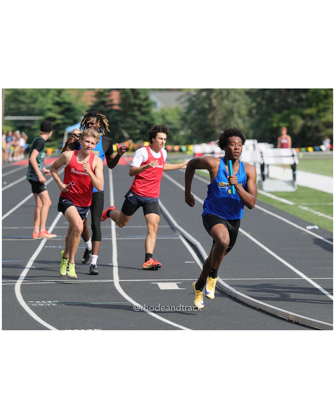 Maya Ferris, Middletown High School, 10 - Loosaper Tate, Portsmouth High School, 10 - Anna Lafontaine, Ponaganset High School, 11 - Elena Pacheco, Cumberland, 11 - Julianna Williams, North Kingstown High School, 12 - Malia Miller, La Salle Academy, 11 - 2026 RI Outdoor Track and Field State Championships - Brown Stadium - Providence, Rhode Island - June 06, 2026 File: ./dir-4x400m/260606-2026-RI-Outdoor-Track-And-Field-State-Championships-Brown-910-296A8188_1.jpg Maya Ferris, Middletown High School, 10 - Loosaper Tate, Portsmouth High School, 10 - Anna Lafontaine, Ponaganset High School, 11 - Elena P…