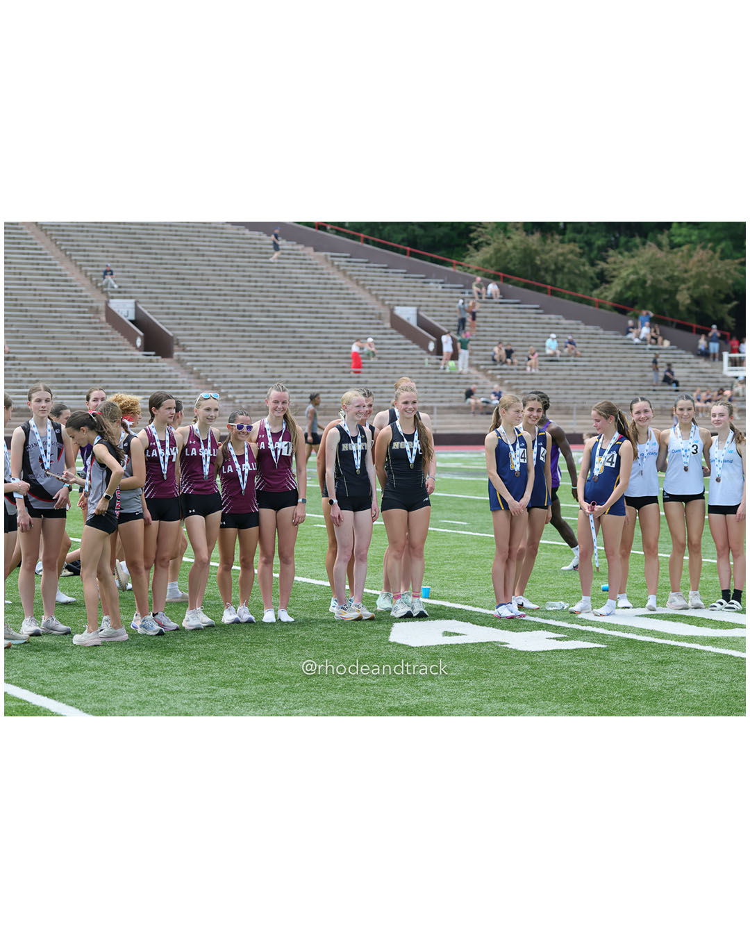 La Salle Academy, La Salle Academy - North Kingstown High School, North Kingstown High School - Barrington High School, Barrington High School - Cumberland, Cumberland - 2026 RI Outdoor Track and Field Championships - Brown Stadium - Providence, Rhode Island - June 06, 2026 File: ./dir-4x800/260606-2026-RI-Outdoor-Track-And-Field-State-Championships-Brown-384-296A6408.jpg La Salle Academy, La Salle Academy - North Kingstown High School, North Kingstown High School - Barrington High School, Barrington High Sch…