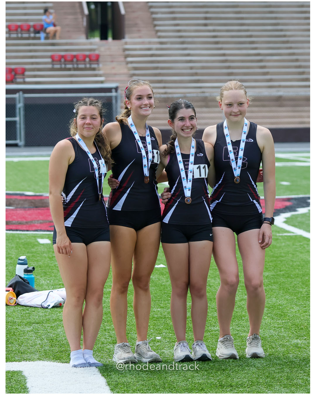 East Greenwich High School, East Greenwich High School - Chariho Regional High School, Chariho Regional High School - 2026 RI Outdoor Track and Field Championships - Brown Stadium - Providence, Rhode Island - June 06, 2026 File: ./dir-4x800/260606-2026-RI-Outdoor-Track-And-Field-State-Championships-Brown-386-296A6521.jpg East Greenwich High School, East Greenwich High School - Chariho Regional High School, Chariho Regional High School - 2026 RI Outdoor Track…