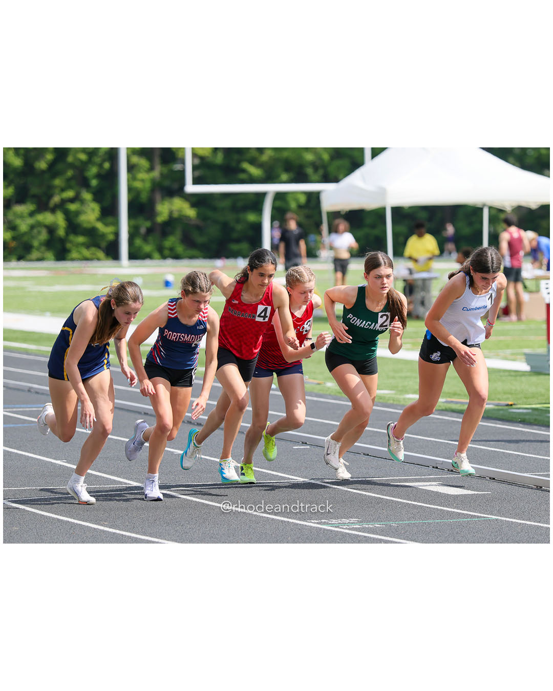 Charli McCue, Cumberland, 12 - Ellie Jackson, Ponaganset High School, 12 - Karuna Lohmann, Narragansett High School, 12 - 2026 RI Outdoor Track and Field State Championships - Brown Stadium - Providence, Rhode Island - June 06, 2026 File: ./dir-800m/260606-2026-RI-Outdoor-Track-And-Field-State-Championships-Brown-698-296A0333.jpg Charli McCue, Cumberland, 12 - Ellie Jackson, Ponaganset High School, 12 - Karuna Lohmann, Narragansett High School, 12 - 2026 RI Outdoor T…