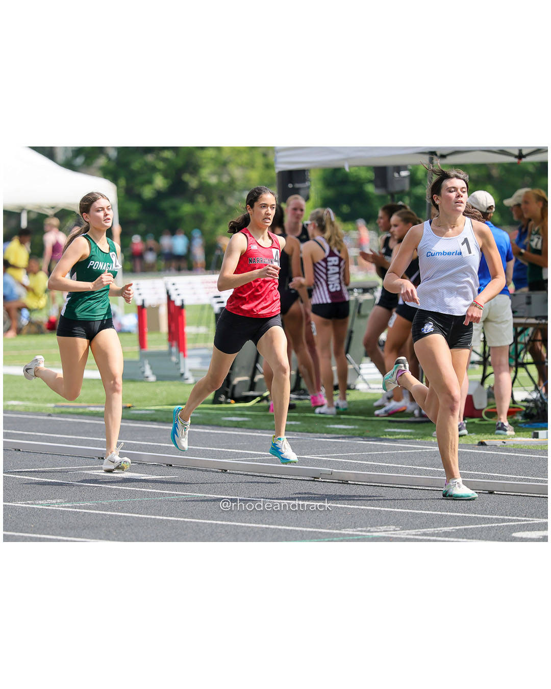 Charli McCue, Cumberland, 12 - Karuna Lohmann, Narragansett High School, 12 - Ellie Jackson, Ponaganset High School, 12 - 2026 RI Outdoor Track and Field State Championships - Brown Stadium - Providence, Rhode Island - June 06, 2026 File: ./dir-800m/260606-2026-RI-Outdoor-Track-And-Field-State-Championships-Brown-701-296A0401.jpg Charli McCue, Cumberland, 12 - Karuna Lohmann, Narragansett High School, 12 - Ellie Jackson, Ponaganset High School, 12 - 2026 RI Outdoor T…