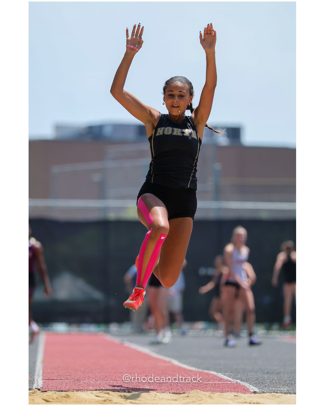 Lily Mbai, North Kingstown High School, 11 - 2026 RI Outdoor Track and Field Championships - Brown Stadium - Providence, Rhode Island - June 06, 2026 File: ./dir-Girls-Long-Jump/260606-2026-RI-Outdoor-Track-And-Field-State-Championships-Brown-101-296A1088.jpg Lily Mbai, North Kingstown High School, 11 - 2026 RI Outdoor Track and Field Championships - Brown Stadium - Providence, Rhode Island - Jun…