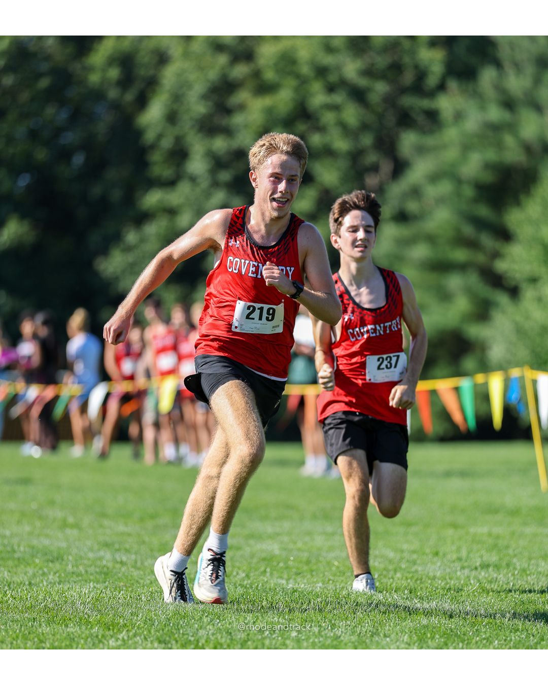 #219 Reese Blackmar, Coventry High School, 5k Run - Boys (W Johnston), P54, 21:20.08; #237 Jackson Wheeler, Coventry High School, 5k Run - Boys (W Johnston), P55, 21:21.15 - #219 Reese Blackmar, Coventry High School, 5k Run - Boys (W Johnston), P54, 21:20.08 - 2026 Injury Fund Carnival XC - Deerfield Park - Greenville, Rhode Island - September 05, 2026 File: ./dir-1-5k_Run-Boys-W_Johnston/260905-2026-injury-fund-xc-deerfield-park-133-398A4530.jpg #219 Reese Blackmar, Coventry High School, 5k Run - Boys (W Johnston), P54, 21:20.08; #237 Jackson Wheeler, Coventry High School, 5k Run -…