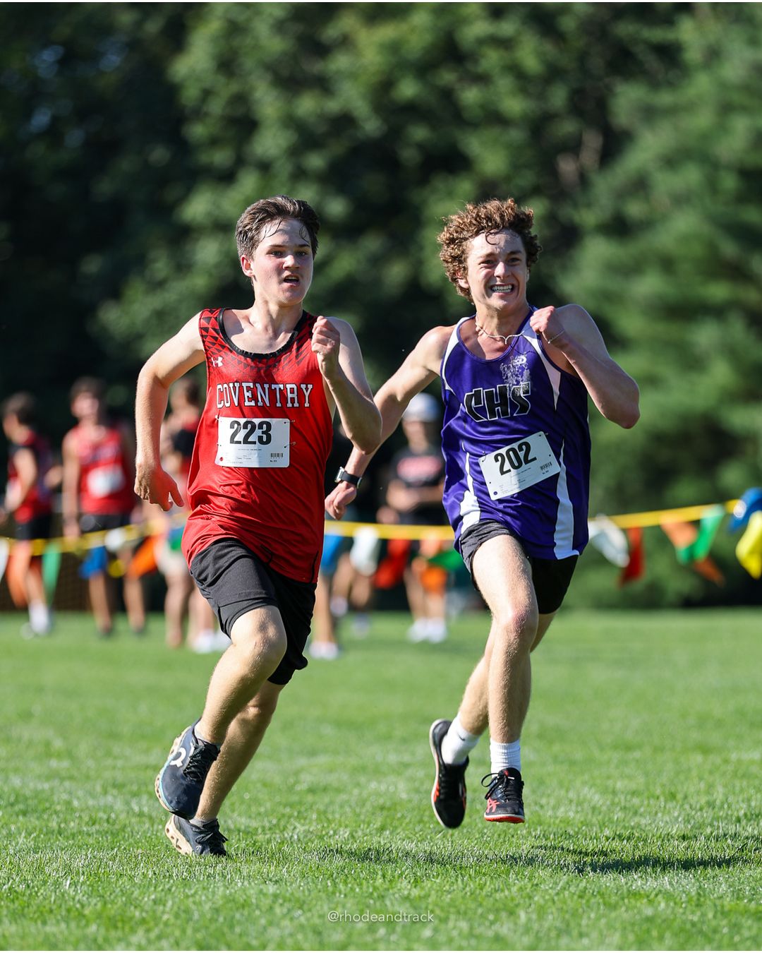 #202 Lucien Poisson, Classical High School, 5k Run - Boys (W Johnston), P73, 23:15.44; #223 James Gilleeney, Coventry High School, 5k Run - Boys (W Johnston), P72, 23:15.23 - #202 Lucien Poisson, Classical High School, 5k Run - Boys (W Johnston), P73, 23:15.44; #223 James Gilleeney, Coventry High School, 5k Run - Boys (W Johnston), P72, 23:15.23 - 2026 Injury Fund Carnival XC - Deerfield Park - Greenville, Rhode Island - September 05, 2026 File: ./dir-1-5k_Run-Boys-W_Johnston/260905-2026-injury-fund-xc-deerfield-park-153-398A4745.jpg #202 Lucien Poisson, Classical High School, 5k Run - Boys (W Johnston), P73, 23:15.44; #223 James Gilleeney, Coventry High School, 5k Run -…