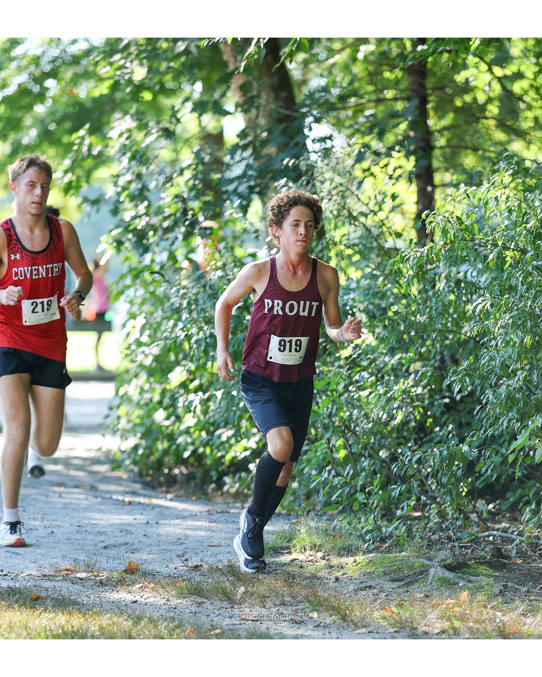 #219 Reese Blackmar, Coventry High School, 5k Run - Boys (W Johnston), P54, 21:20.08 - #919 Christian Lombardi, La Salle Academy, 5k Run - Boys (W Johnston), P64, 21:57.73; #219 Reese Blackmar, Coventry High School, 5k Run - Boys (W Johnston), P54, 21:20.08 - 2026 Injury Fund Carnival XC - Deerfield Park - Greenville, Rhode Island - September 05, 2026 File: ./dir-1-5k_Run-Boys-W_Johnston/260905-2026-injury-fund-xc-deerfield-park-51-398A3405.jpg #219 Reese Blackmar, Coventry High School, 5k Run - Boys (W Johnston), P54, 21:20.08 - #919 Christian Lombardi, La Salle Academy, 5k Run -…