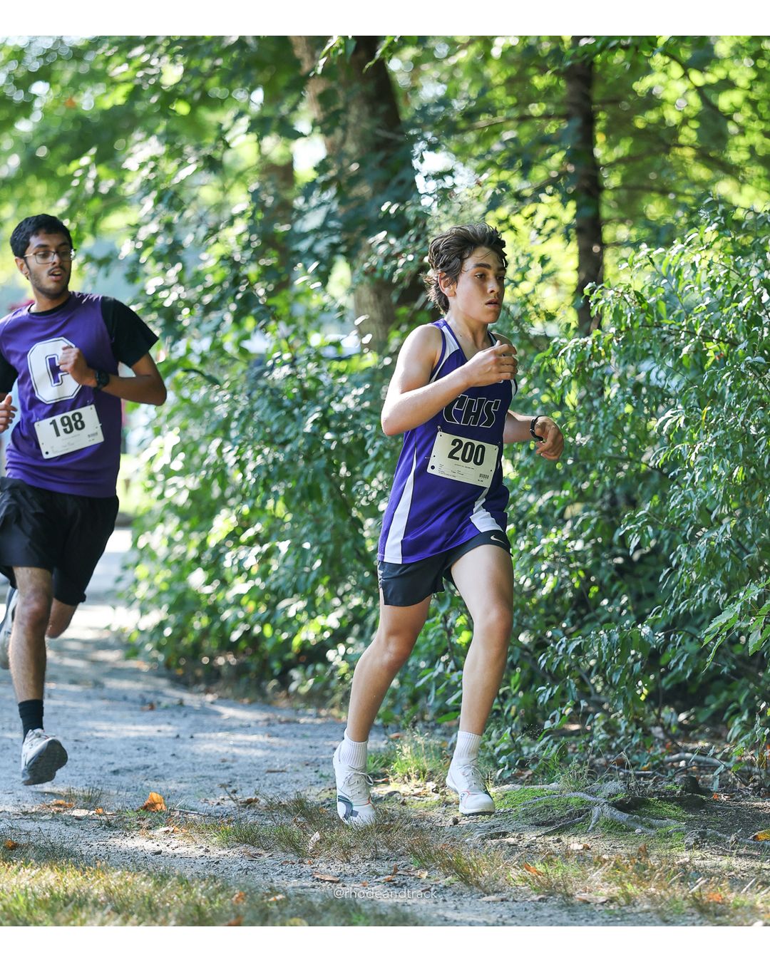#200 John Lux Fawzi, Classical High School, 5k Run - Boys (W Johnston), P51, 21:10.23; #198 Hender Laureano, Classical High School, 5k Run - Boys (W Johnston), P68, 22:28.41 - 2026 Injury Fund Carnival XC - Deerfield Park - Greenville, Rhode Island - September 05, 2026 File: ./dir-1-5k_Run-Boys-W_Johnston/260905-2026-injury-fund-xc-deerfield-park-53-398A3423.jpg #200 John Lux Fawzi, Classical High School, 5k Run - Boys (W Johnston), P51, 21:10.23; #198 Hender Laureano, Classical High School, 5k Run…