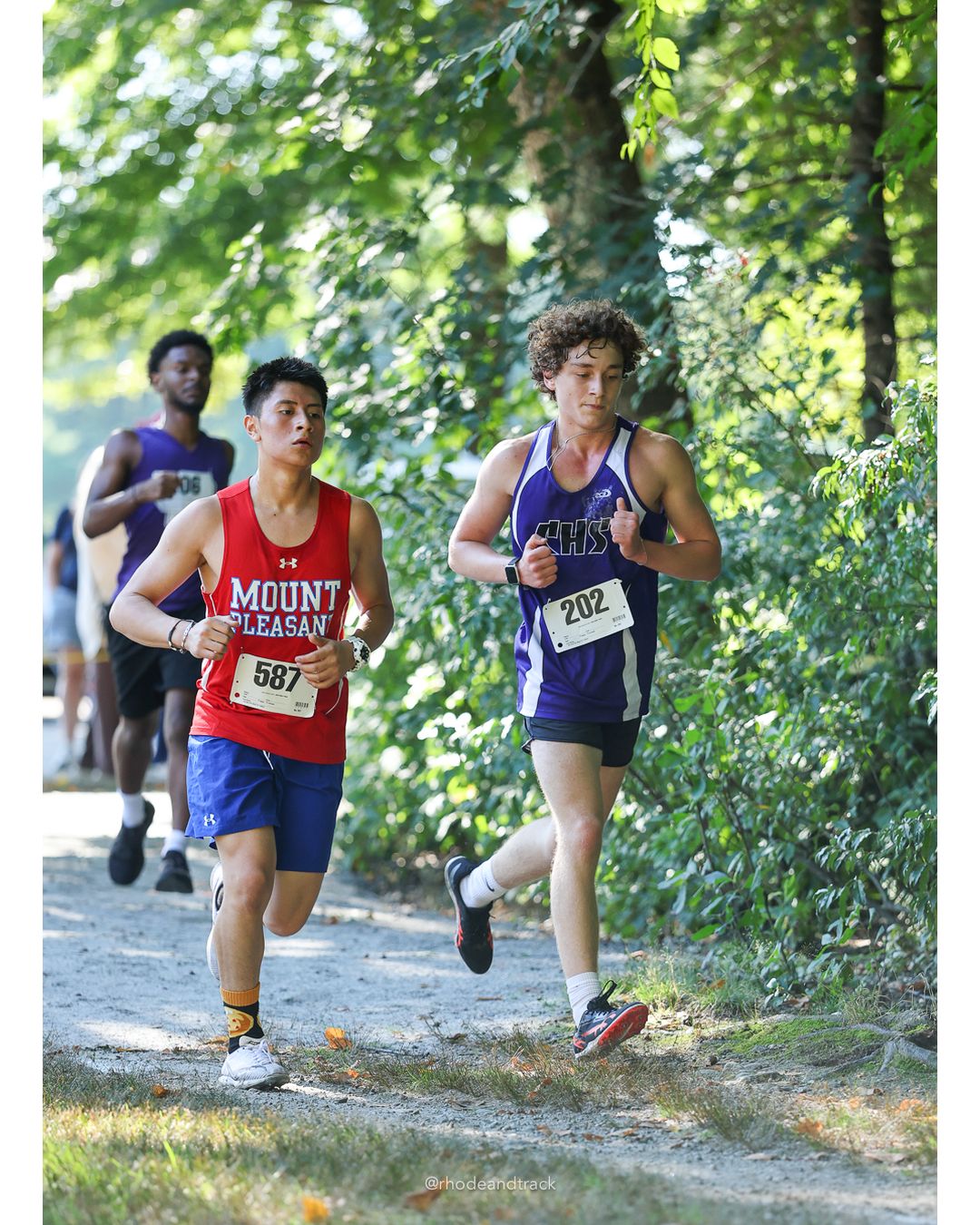 #202 Lucien Poisson, Classical High School, 5k Run - Boys (W Johnston), P73, 23:15.44; #1587 Carley Raposo, North Kingstown High School - #202 Lucien Poisson, Classical High School, 5k Run - Boys (W Johnston), P73, 23:15.44 - 2026 Injury Fund Carnival XC - Deerfield Park - Greenville, Rhode Island - September 05, 2026 File: ./dir-1-5k_Run-Boys-W_Johnston/260905-2026-injury-fund-xc-deerfield-park-68-398A3559.jpg #202 Lucien Poisson, Classical High School, 5k Run - Boys (W Johnston), P73, 23:15.44; #1587 Carley Raposo, North Kingstown High School - #…