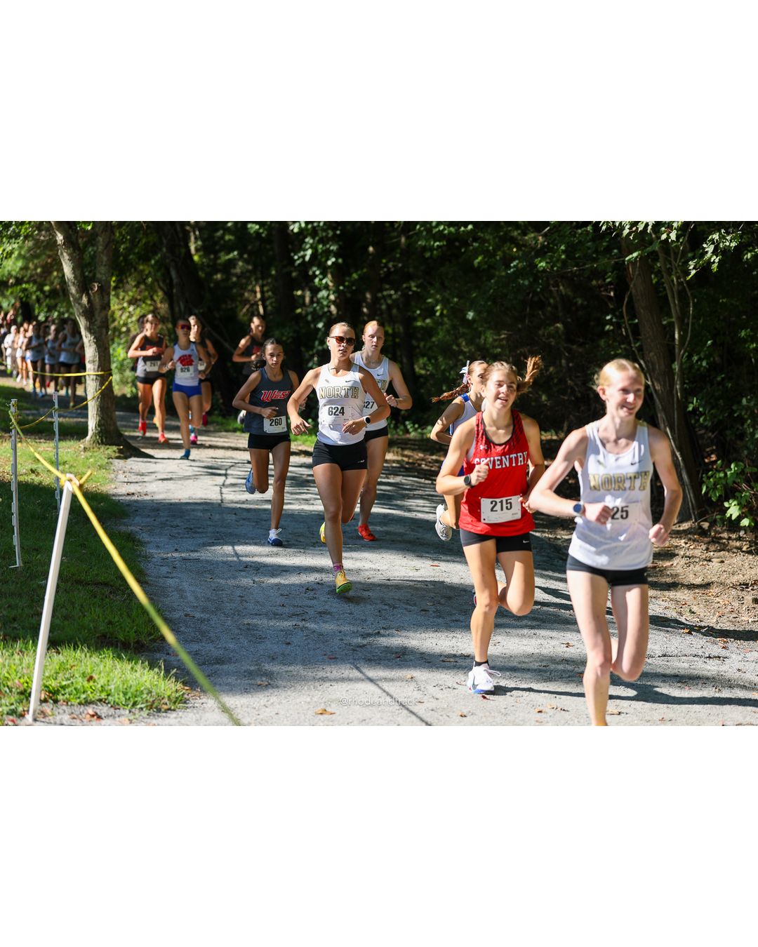 #215 Molly Richardson, Coventry High School, 5k Run - Girls (Roy), P3, 19:35.47; #624 Lucy Stowe, North Kingstown High School, 5k Run - Girls (Roy), P1, 19:23.76 - 2026 Injury Fund Carnival XC - Deerfield Park - Greenville, Rhode Island - September 05, 2026 File: ./dir-2-5k_Run-Girls-Roy/260905-2026-injury-fund-xc-deerfield-park-177-398A5085.jpg #215 Molly Richardson, Coventry High School, 5k Run - Girls (Roy), P3, 19:35.47; #624 Lucy Stowe, North Kingstown High School, 5k Run - Gir…