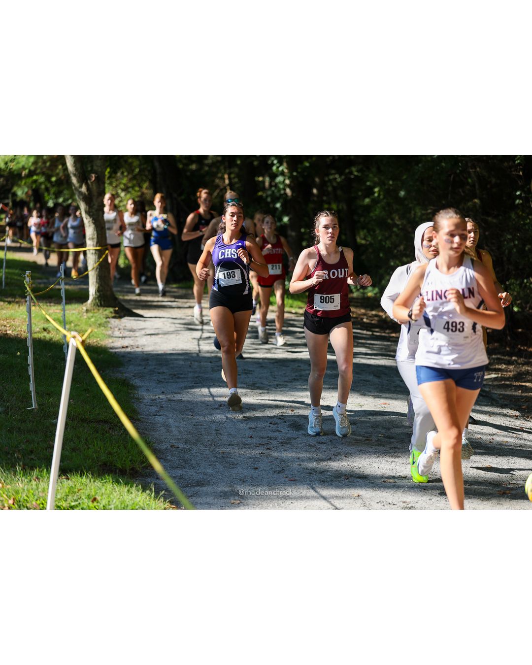 #493 Meredith Evans, Lincoln High School, 5k Run - Girls (Roy), P15, 22:11.47 - #493 Meredith Evans, Lincoln High School, 5k Run - Girls (Roy), P15, 22:11.47; #193 Abigail Rymer, Classical High School, 5k Run - Girls (Roy), P32, 24:42.69 - 2026 Injury Fund Carnival XC - Deerfield Park - Greenville, Rhode Island - September 05, 2026 File: ./dir-2-5k_Run-Girls-Roy/260905-2026-injury-fund-xc-deerfield-park-185-398A5191.jpg #493 Meredith Evans, Lincoln High School, 5k Run - Girls (Roy), P15, 22:11.47 - #493 Meredith Evans, Lincoln High School, 5k Run - Girls (R…