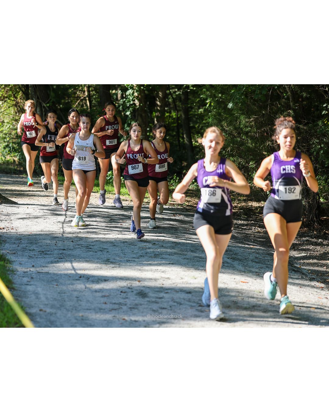 #186 Sabine Goldsmith, Classical High School, 5k Run - Girls (Roy), P55, 27:41.80; #898 Herley Fils, La Salle Academy, 5k Run - Girls (Roy), P59, 28:12.60 - #186 Sabine Goldsmith, Classical High School, 5k Run - Girls (Roy), P55, 27:41.80; #907 Jaden Nebot, La Salle Academy, 5k Run - Girls (Roy), P60, 28:15.33 - 2026 Injury Fund Carnival XC - Deerfield Park - Greenville, Rhode Island - September 05, 2026 File: ./dir-2-5k_Run-Girls-Roy/260905-2026-injury-fund-xc-deerfield-park-193-398A5320.jpg #186 Sabine Goldsmith, Classical High School, 5k Run - Girls (Roy), P55, 27:41.80; #898 Herley Fils, La Salle Academy, 5k Run - Girls (Roy)…