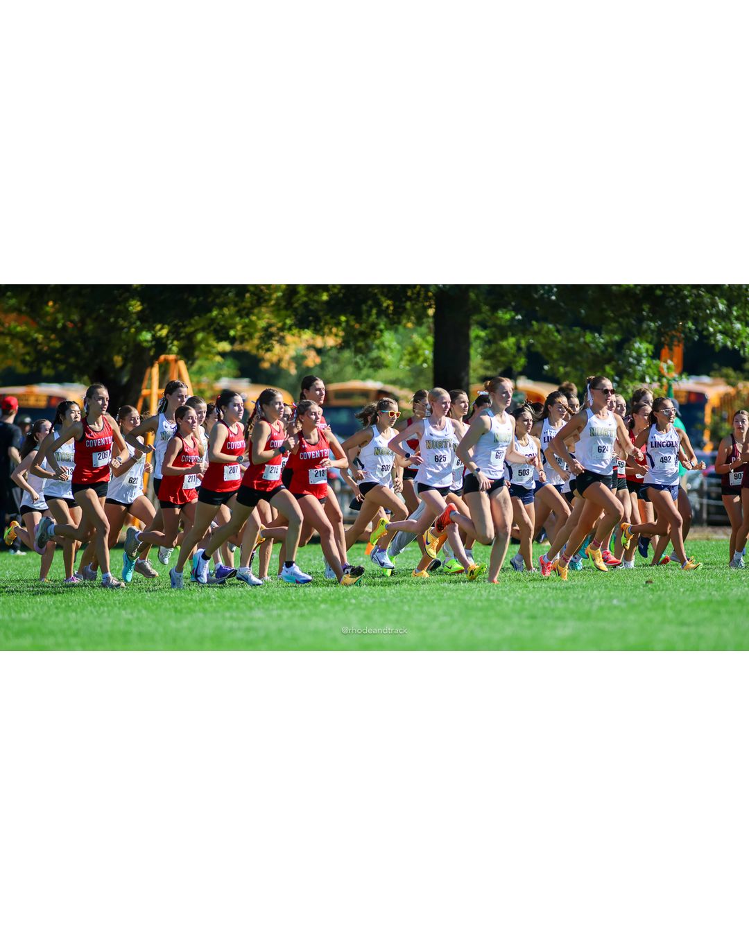 #625 Abbie Tighe, North Kingstown High School, 5k Run - Girls (Roy), P2, 19:31.96; #503 Ezrie Zahlany, Lincoln High School, 5k Run - Girls (Roy), P22, 22:55.12 - #207 Leah Brosseau, Coventry High School, 5k Run - Girls (Roy), P20, 22:39.11 - 2026 Injury Fund Carnival XC - Deerfield Park - Greenville, Rhode Island - September 05, 2026 File: ./dir-2-5k_Run-Girls-Roy/260905-2026-injury-fund-xc-deerfield-park-208-8P0A0095.jpg #625 Abbie Tighe, North Kingstown High School, 5k Run - Girls (Roy), P2, 19:31.96; #503 Ezrie Zahlany, Lincoln High School, 5k Run - Girls…