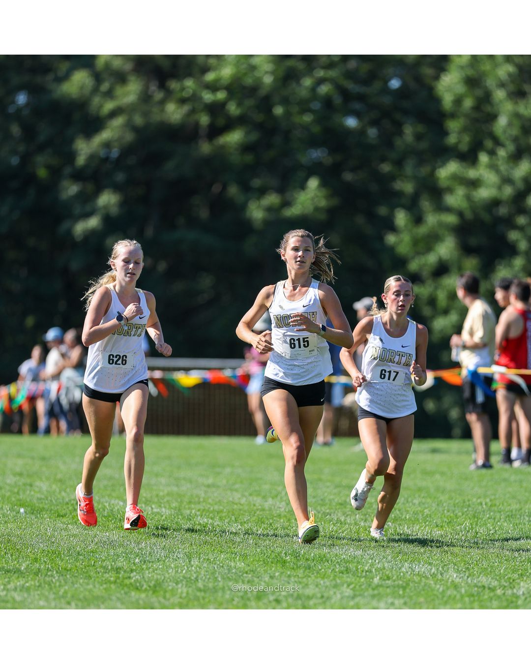 #617 Riley Morrison, North Kingstown High School, 5k Run - Girls (Roy), P10, 21:40.16; #615 Anna Mansfield, North Kingstown High School, 5k Run - Girls (Roy), P9, 21:39.64; #626 Avrie Tighe, North Kingstown High School, 5k Run - Girls (Roy), P11, 21:40.67 - #615 Anna Mansfield, North Kingstown High School, 5k Run - Girls (Roy), P9, 21:39.64; #617 Riley Morrison, North Kingstown High School, 5k Run - Girls (Roy), P10, 21:40.16 - 2026 Injury Fund Carnival XC - Deerfield Park - Greenville, Rhode Island - September 05, 2026 File: ./dir-2-5k_Run-Girls-Roy/260905-2026-injury-fund-xc-deerfield-park-227-398A5645.jpg #617 Riley Morrison, North Kingstown High School, 5k Run - Girls (Roy), P10, 21:40.16; #615 Anna Mansfield, North Kingstown High School, 5k…