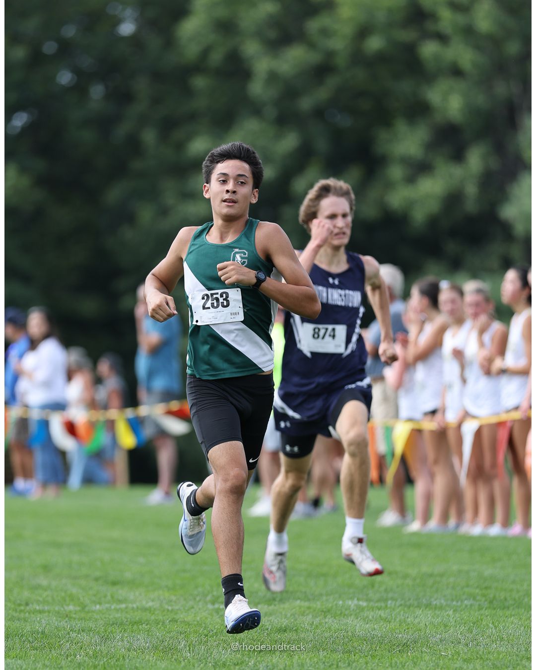 #253 Levi Soch, Cranston East High School, 5k Run - Boys (K Johnston), P16, 17:50.73 - #253 Levi Soch, Cranston East High School, 5k Run - Boys (K Johnston), P16, 17:50.73; #874 Erik Dahl, South Kingstown High School, 5k Run - Boys (K Johnston), P15, 17:50.14 - 2026 Injury Fund Carnival XC - Deerfield Park - Greenville, Rhode Island - September 05, 2026 File: ./dir-3-5k_Run-Boys-K_Johnston/260905-2026-injury-fund-xc-deerfield-park-405-398A8100.jpg #253 Levi Soch, Cranston East High School, 5k Run - Boys (K Johnston), P16, 17:50.73 - #253 Levi Soch, Cranston East High School, 5k Run -…